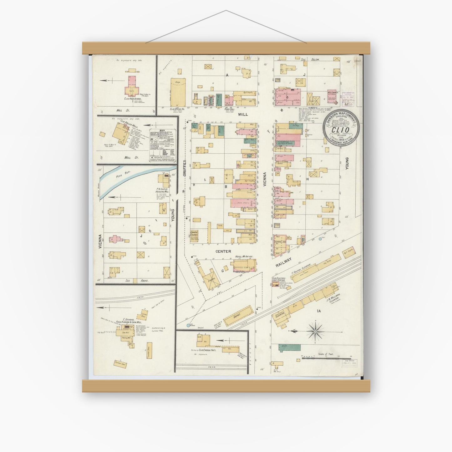 Old map wall art mockup — magnetic wood frame on white wall — Sanborn Fire Insurance Map from Clio, Genesee County, Michigan (1902), Sheet #0001