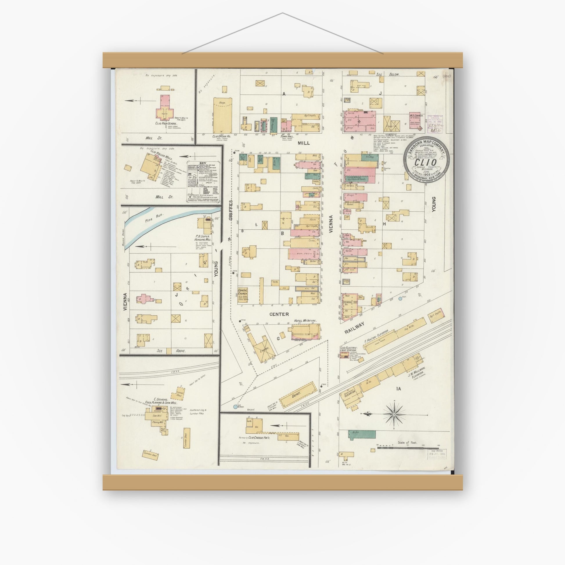 Old map wall art mockup — magnetic wood frame on white wall — Sanborn Fire Insurance Map from Clio, Genesee County, Michigan (1902), Sheet #0001