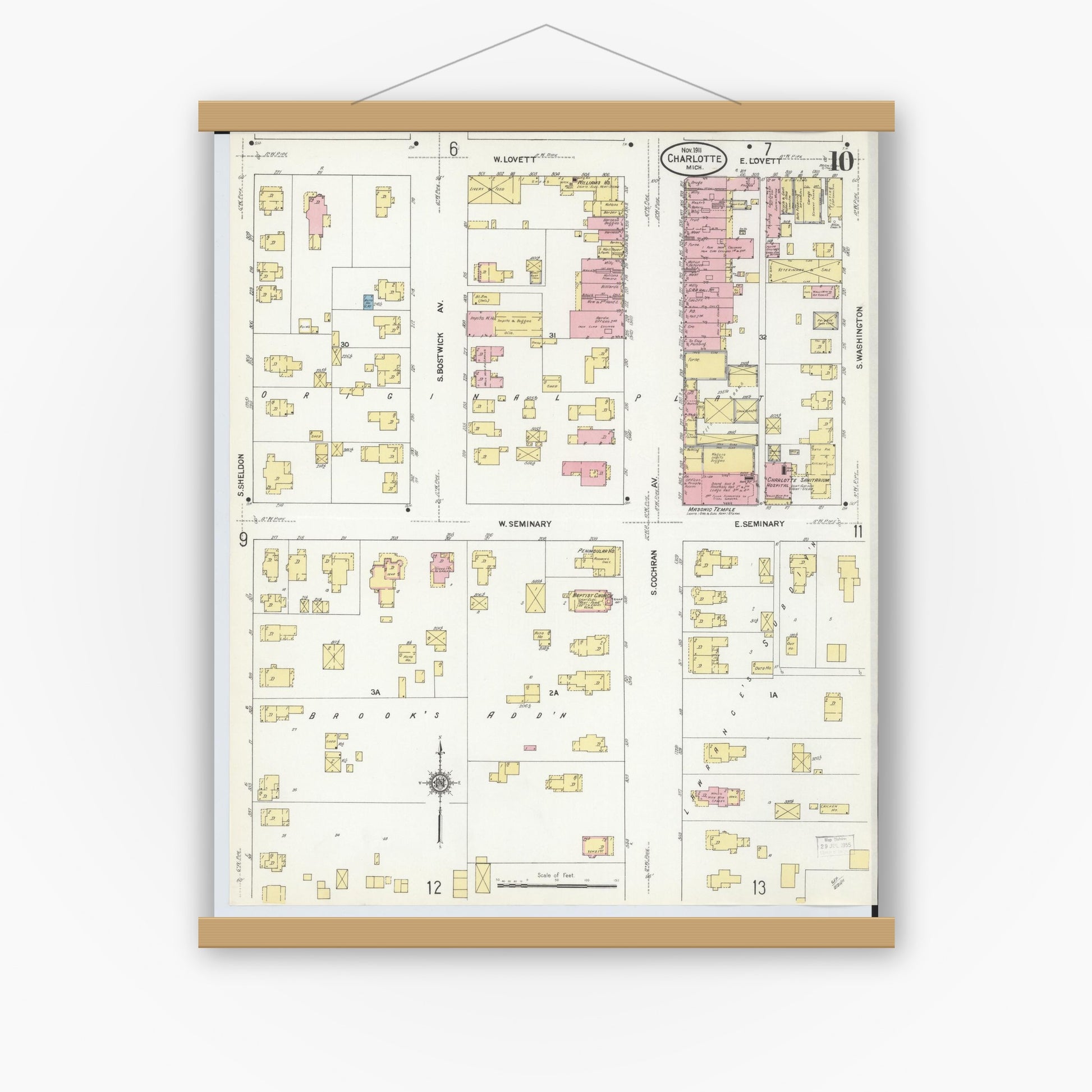 Old map wall art mockup — magnetic wood frame on white wall — Sanborn Fire Insurance Map from Charlotte, Eaton County, Michigan (1911), Sheet #0010