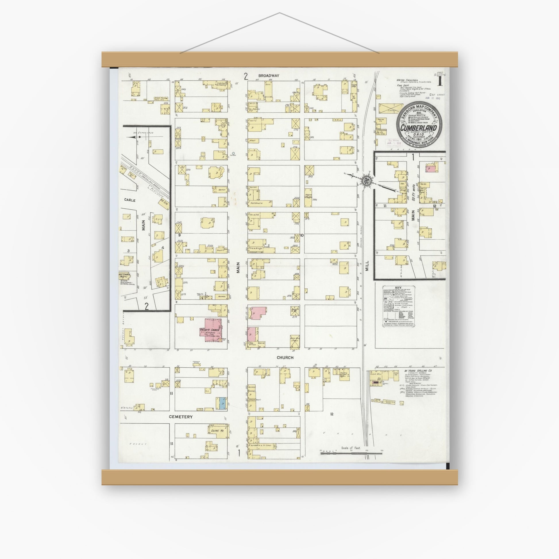 Old map wall art mockup — magnetic wood frame on white wall — Sanborn Fire Insurance Map from Cumberland, Guernsey County, Ohio (1911) - Complete Map Set