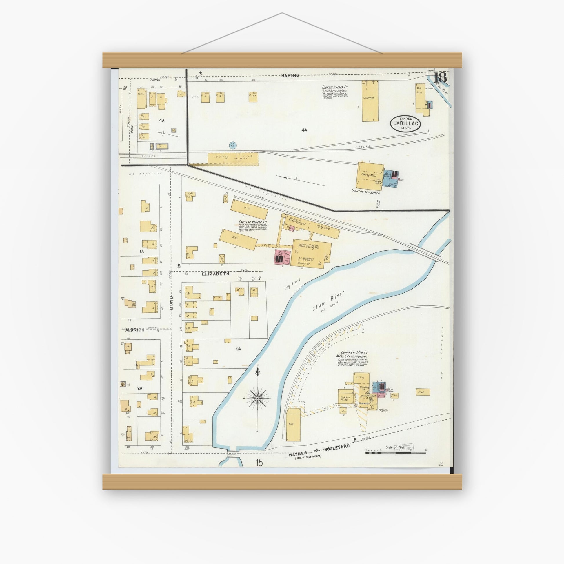Old map wall art mockup — magnetic wood frame on white wall — Sanborn Fire Insurance Map from Cadillac, Wexford County, Michigan (1906), Sheet #0018