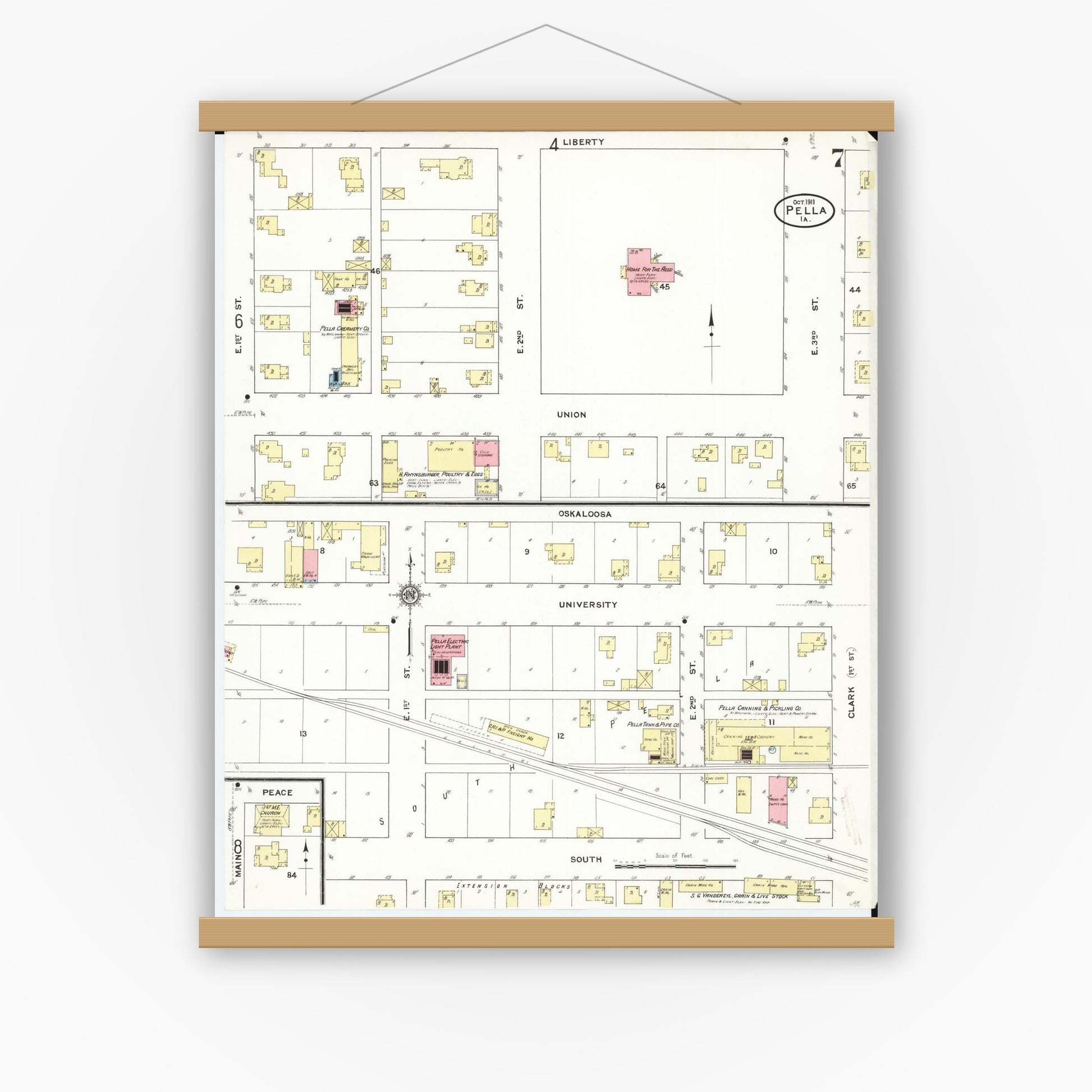 Old map wall art mockup — magnetic wood frame on white wall — Sanborn Fire Insurance Map from Pella, Marion County, Iowa (1911), Sheet #0007