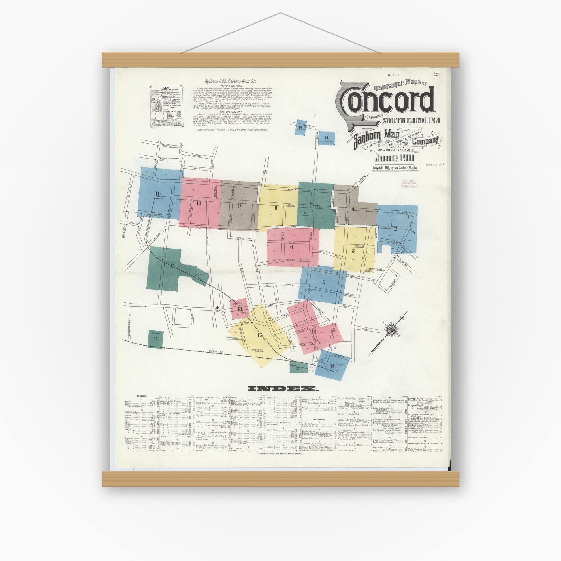 Old map wall art mockup — magnetic wood frame on white wall — Sanborn Fire Insurance Map from Concord, Cabarrus County, North Carolina (1911) - Complete Map Set