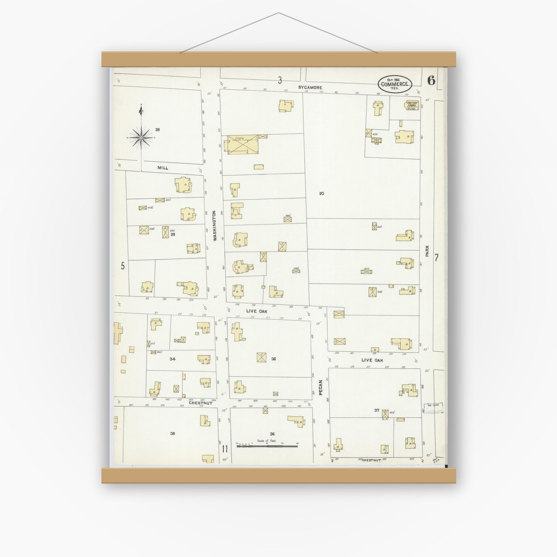 Old map wall art mockup — magnetic wood frame on white wall — Sanborn Fire Insurance Map from Commerce, Hunt County, Texas (1906), Sheet #0006