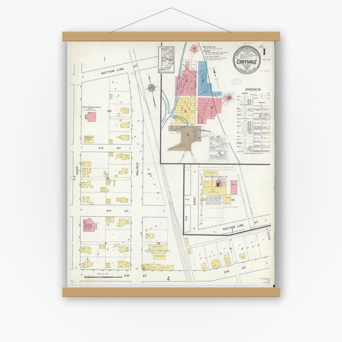 Old map wall art mockup — magnetic wood frame on white wall — Sanborn Fire Insurance Map from Carthage, Rush County, Indiana (1916) - Complete Map Set