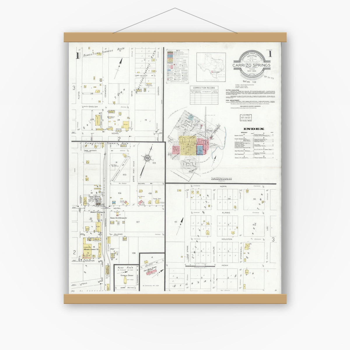 Old map wall art mockup — magnetic wood frame on white wall — Sanborn Fire Insurance Map from Carrizo Springs, Dimmit County, Texas (1933) - Complete Map Set