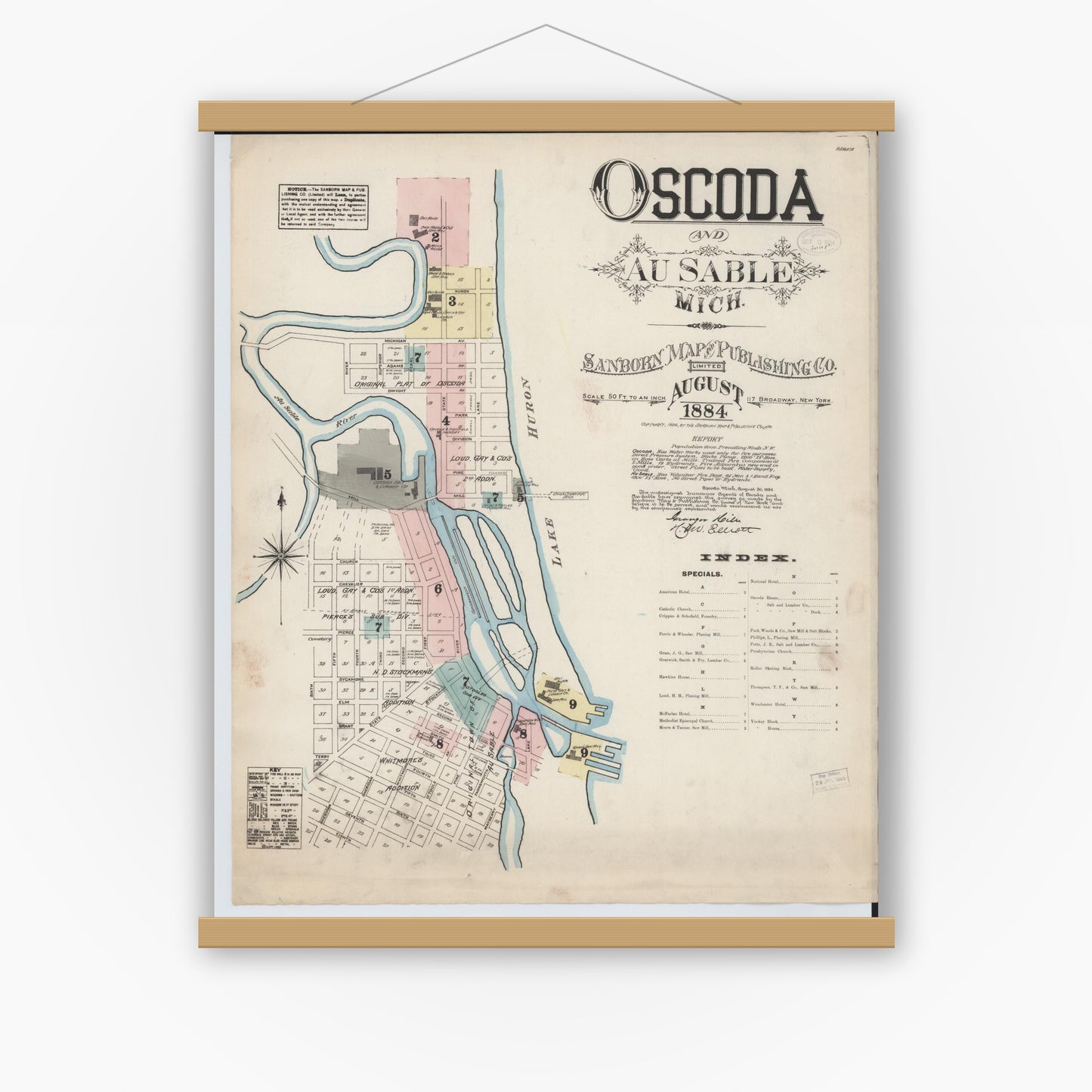 Old map wall art mockup — magnetic wood frame on white wall — Sanborn Fire Insurance Map from Oscoda, Iosco County, Michigan (1884), Sheet #0001