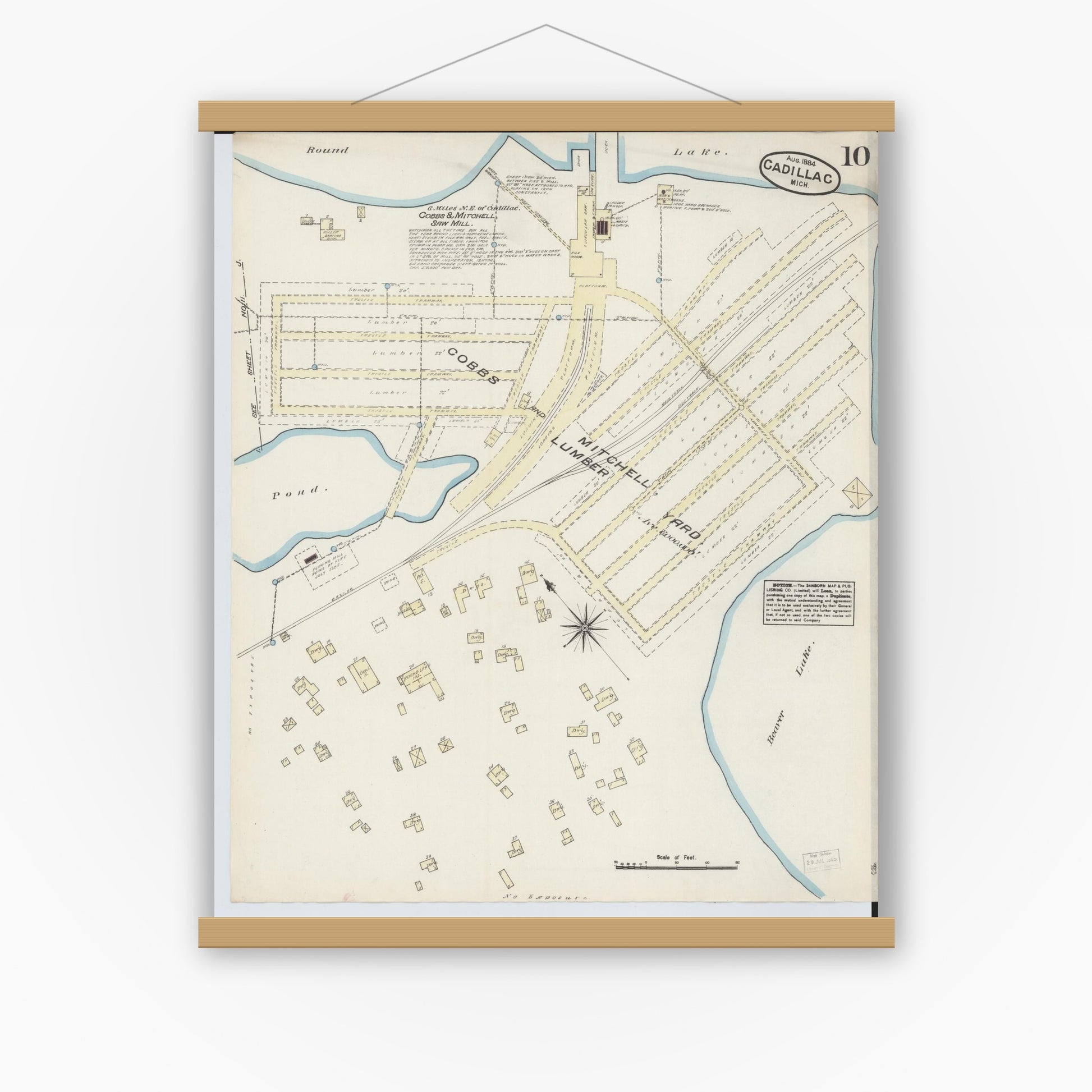Old map wall art mockup — magnetic wood frame on white wall — Sanborn Fire Insurance Map from Cadillac, Wexford County, Michigan (1884), Sheet #0010