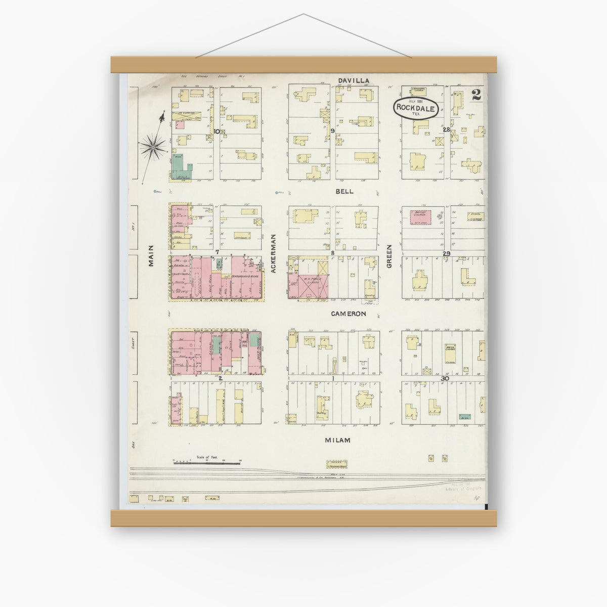 Old map wall art mockup — magnetic wood frame on white wall — Sanborn Fire Insurance Map from Rockdale, Milam County, Texas (1891), Sheet #0002