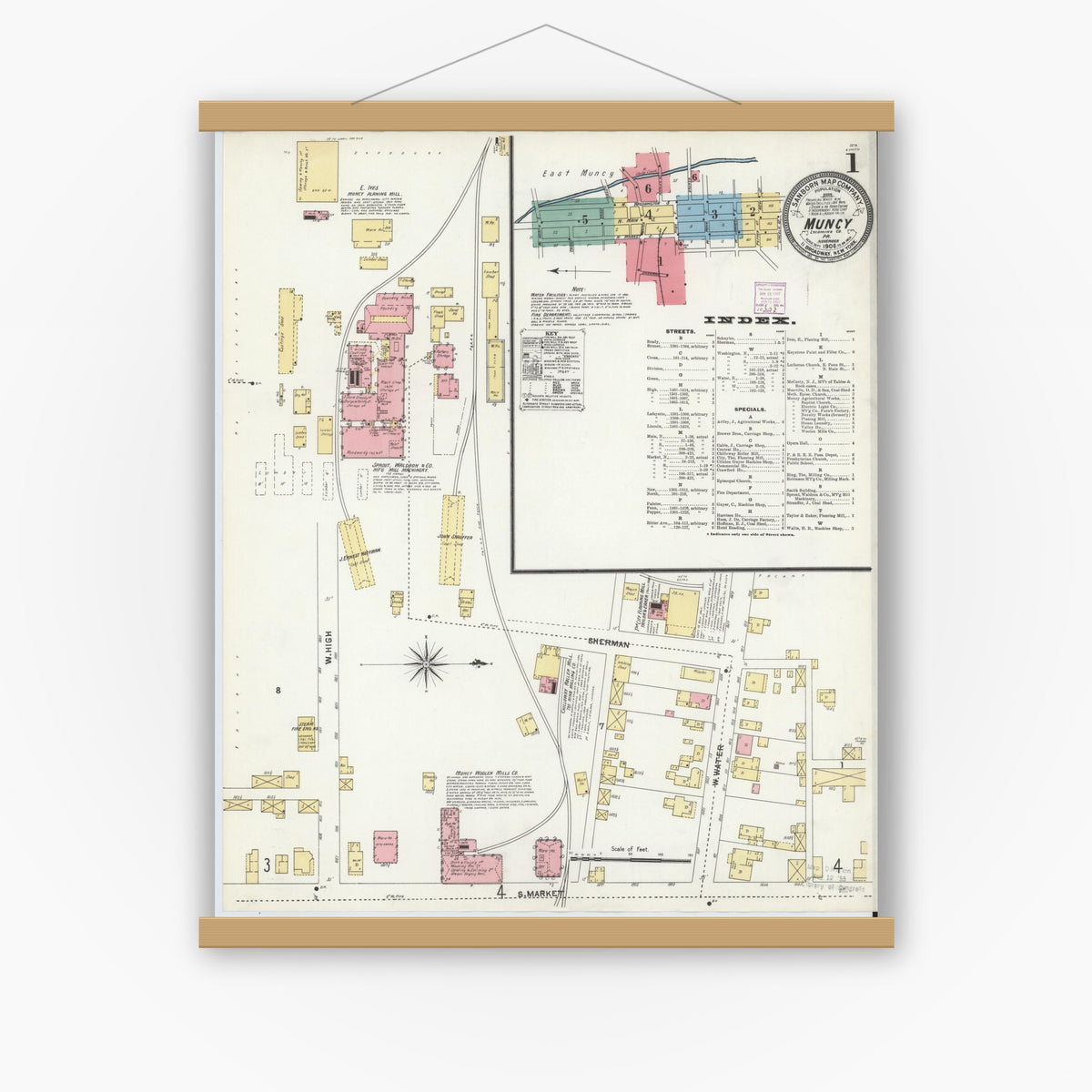 Old map wall art mockup — magnetic wood frame on white wall — Sanborn Fire Insurance Map from Muncy, Lycoming County, Pennsylvania (1906), Sheet #0001