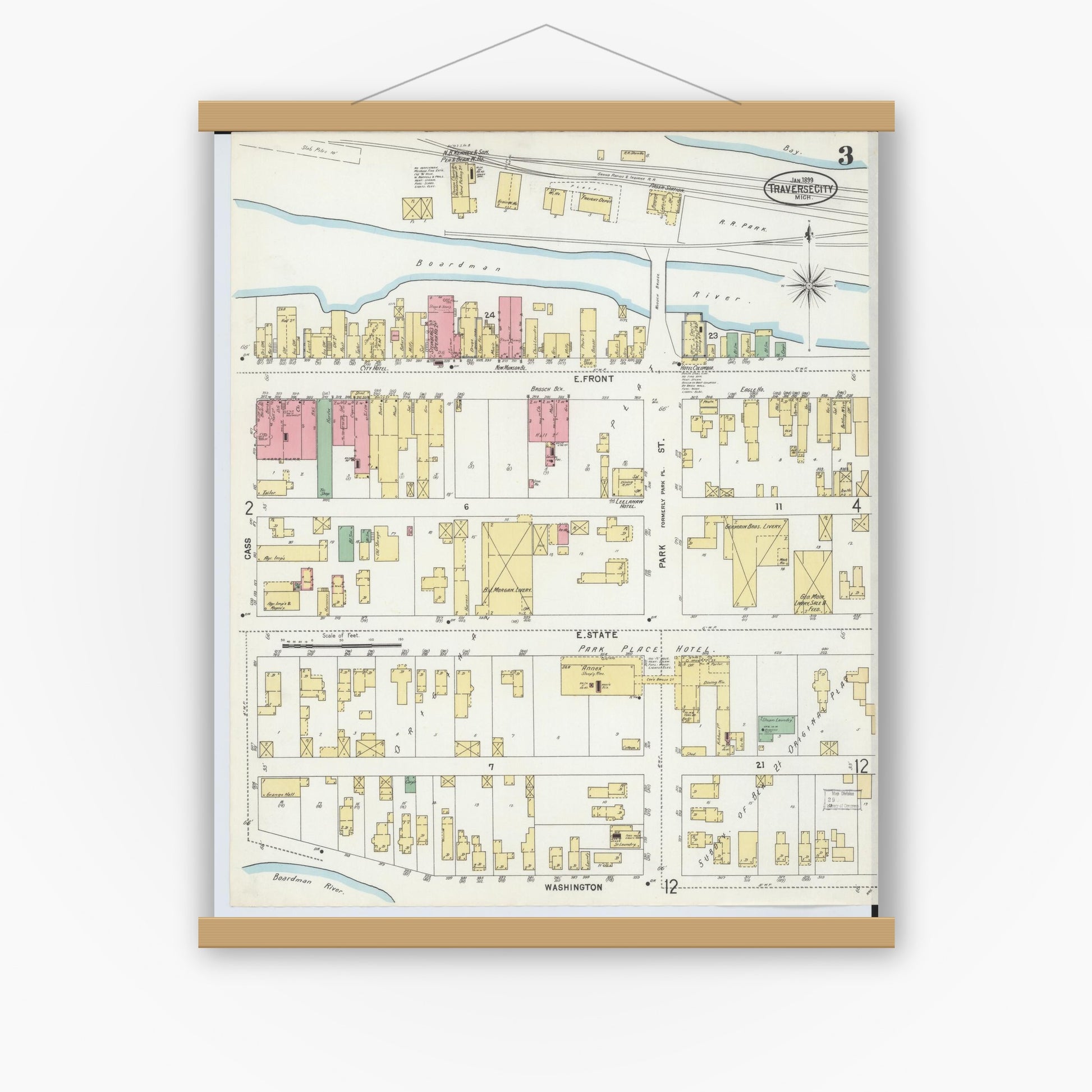 Old map wall art mockup — magnetic wood frame on white wall — Sanborn Fire Insurance Map from Traverse City, Grand Traverse County, Michigan (1899), Sheet #0003