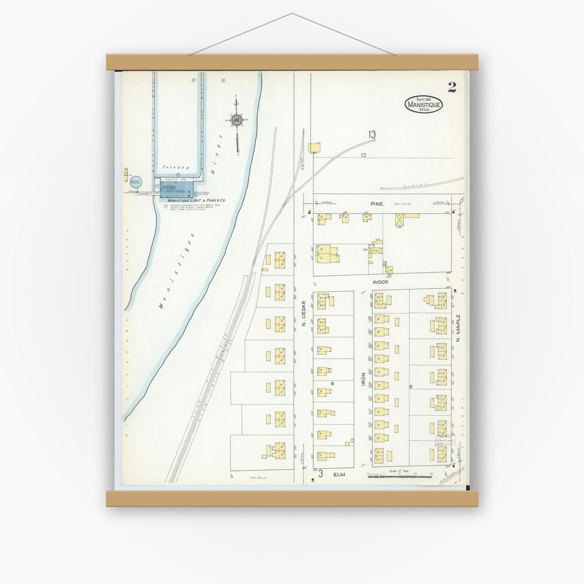 Old map wall art mockup — magnetic wood frame on white wall — Sanborn Fire Insurance Map from Manistique, Schoolcraft County, Michigan (1914), Sheet #0002