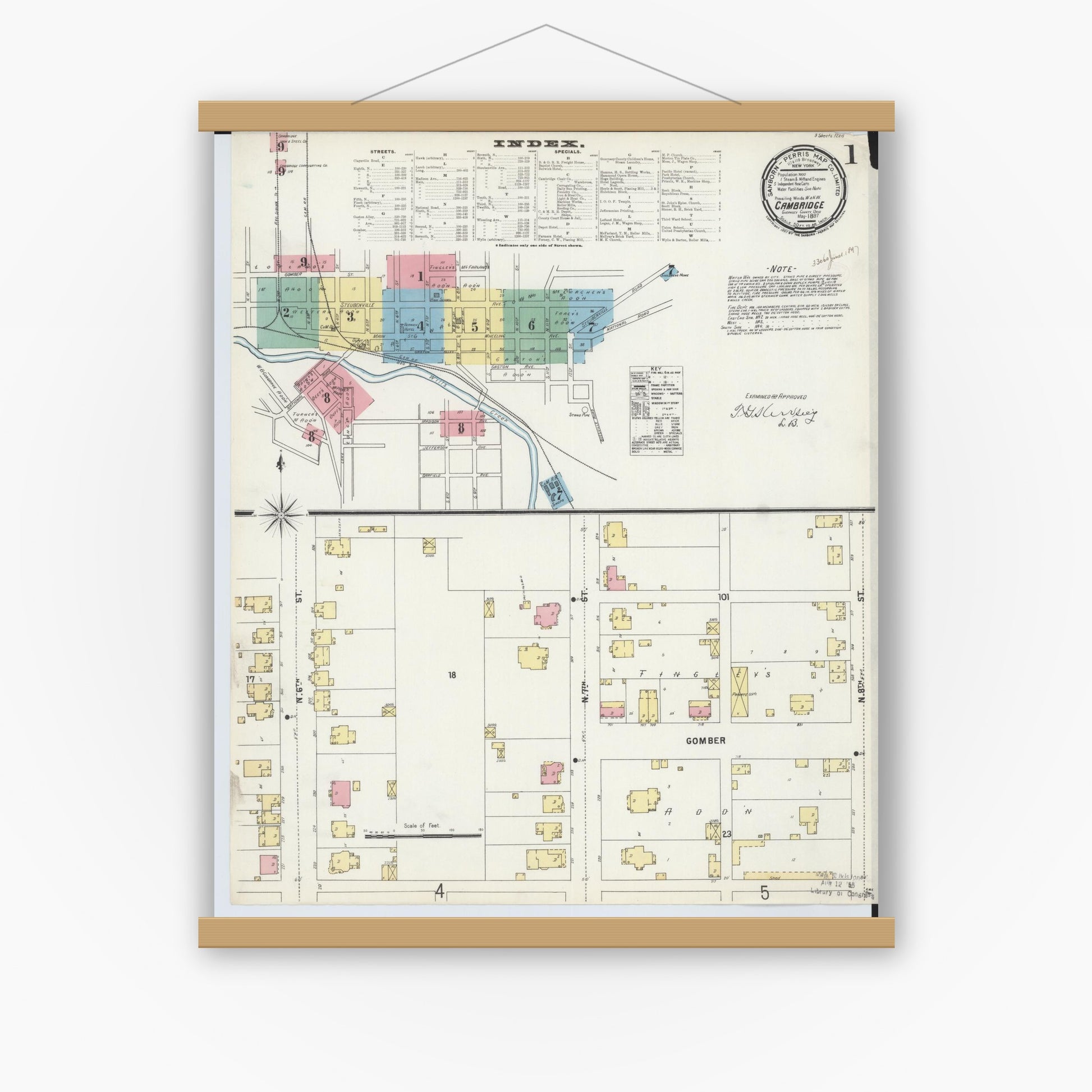 Old map wall art mockup — magnetic wood frame on white wall — Sanborn Fire Insurance Map from Cambridge, Guernsey County, Ohio (1897), Sheet #0001