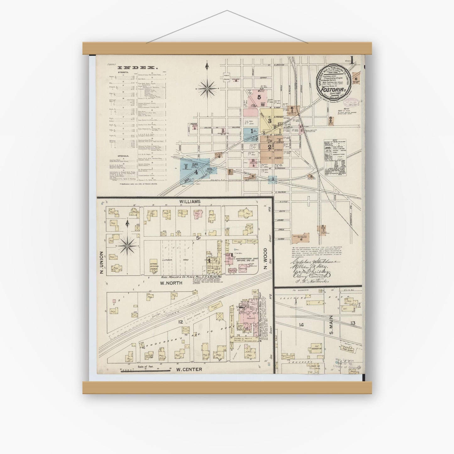 Old map wall art mockup — magnetic wood frame on white wall — Sanborn Fire Insurance Map from Fostoria, Seneca, Hancock, And Wood Counties, Ohio (1887), Sheet #0001