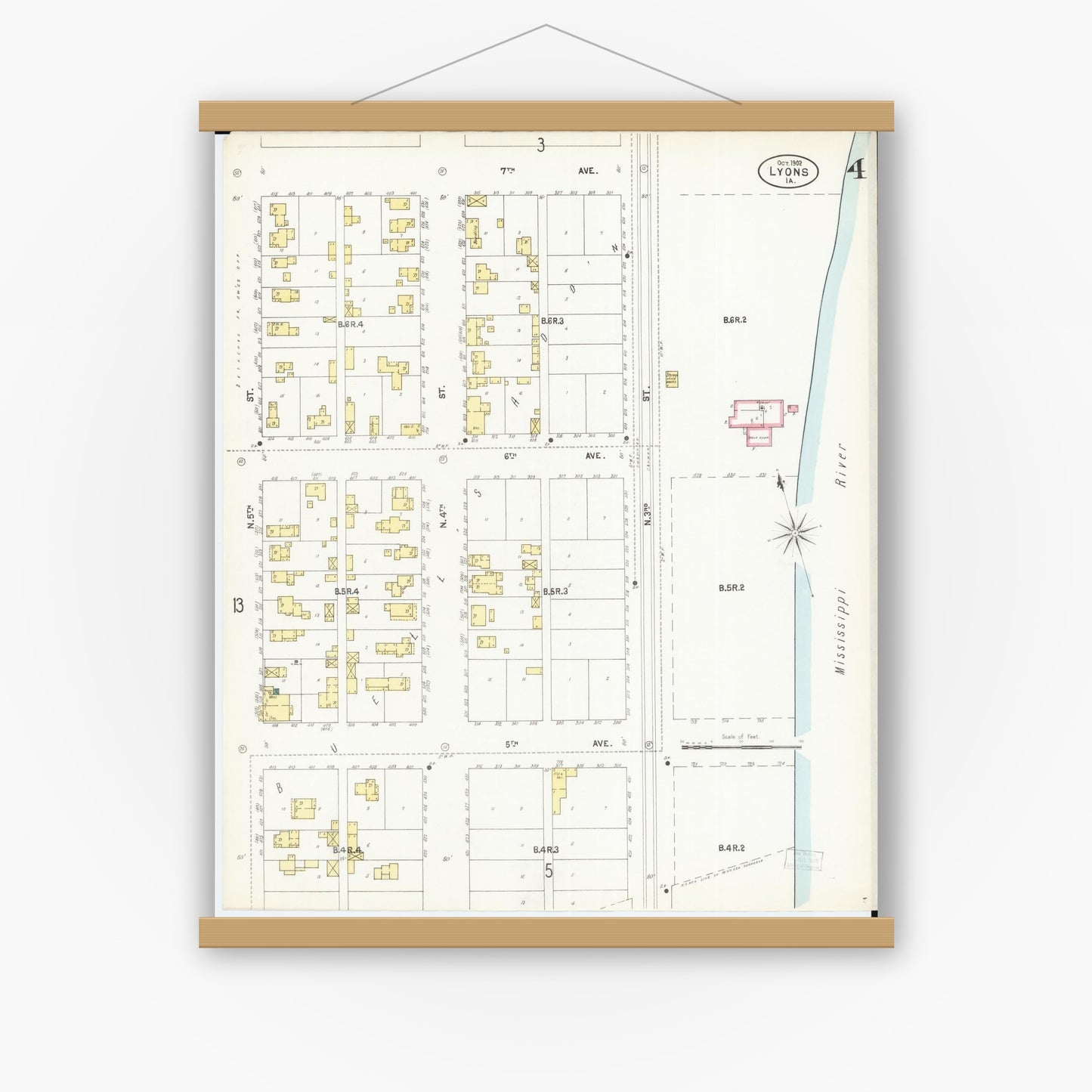 Old map wall art mockup — magnetic wood frame on white wall — Sanborn Fire Insurance Map from Lyons, Clinton County, Iowa (1902), Sheet #0004