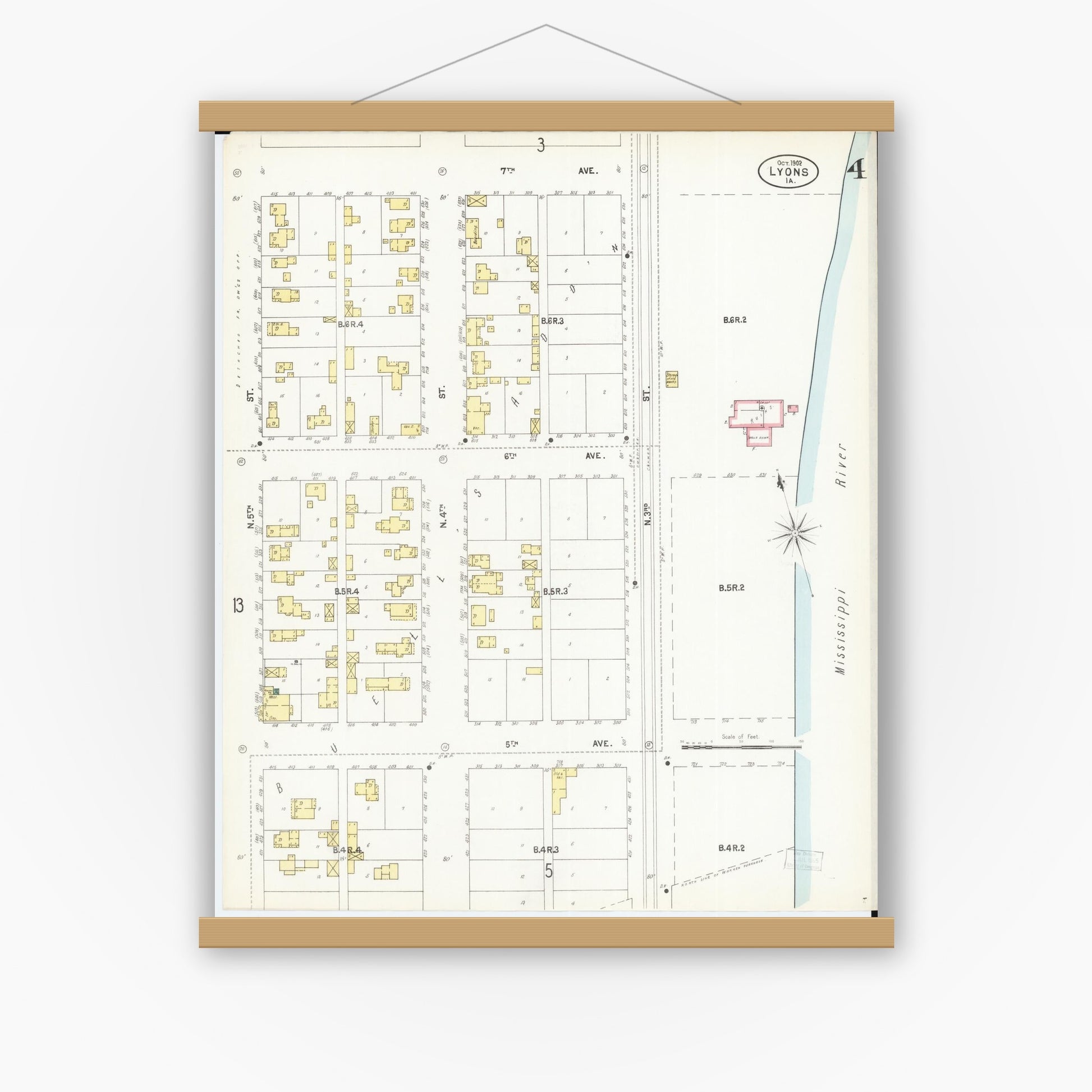 Old map wall art mockup — magnetic wood frame on white wall — Sanborn Fire Insurance Map from Lyons, Clinton County, Iowa (1902), Sheet #0004