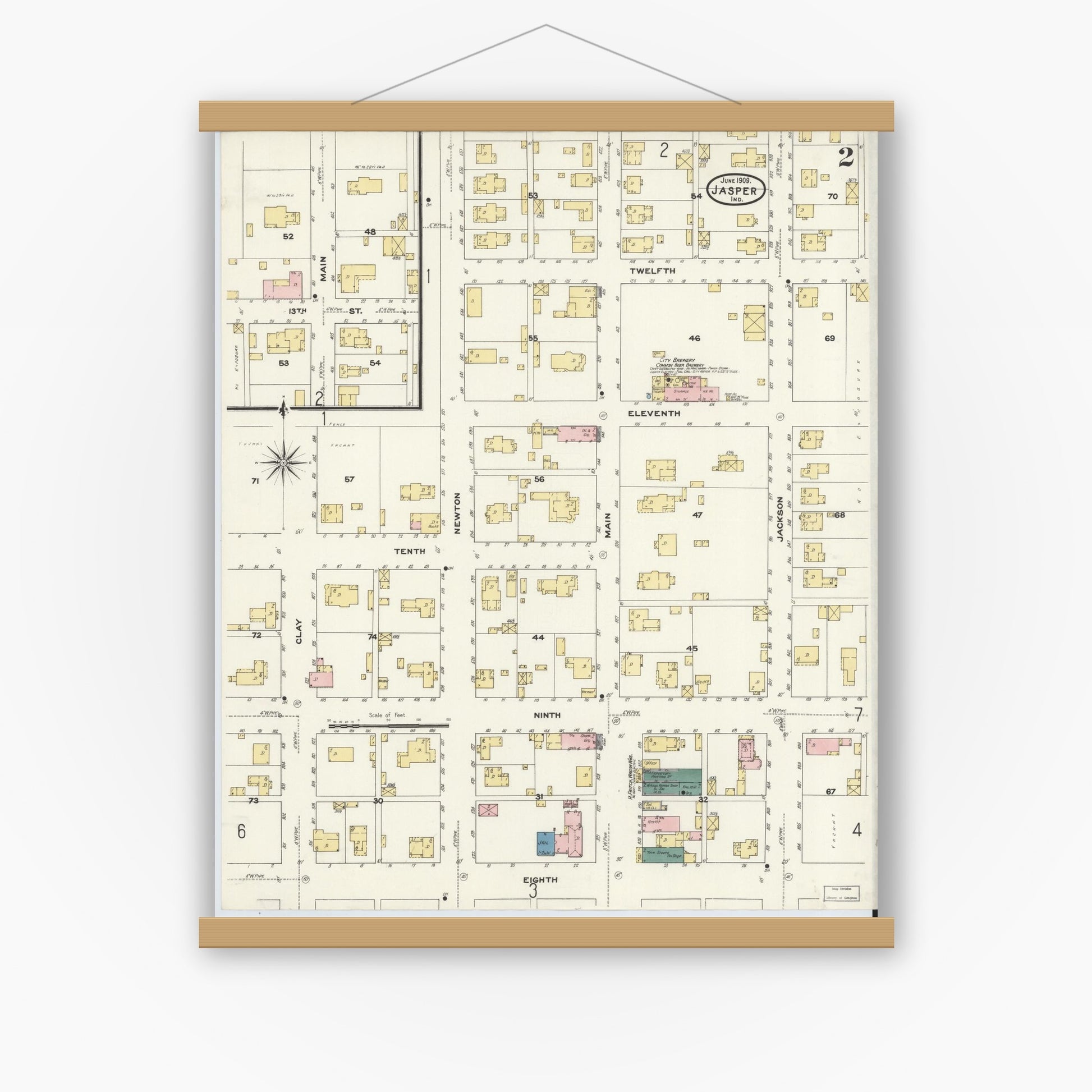 Old map wall art mockup — magnetic wood frame on white wall — Sanborn Fire Insurance Map from Jasper, Dubois County, Indiana (1909), Sheet #0002