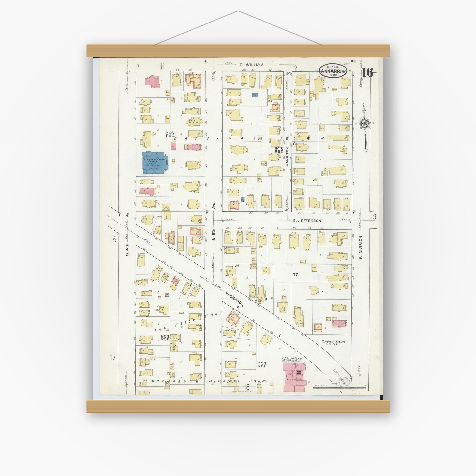 Old map wall art mockup — magnetic wood frame on white wall — Sanborn Fire Insurance Map from Ann Arbor, Washtenaw County, Michigan (1916), Sheet #0016