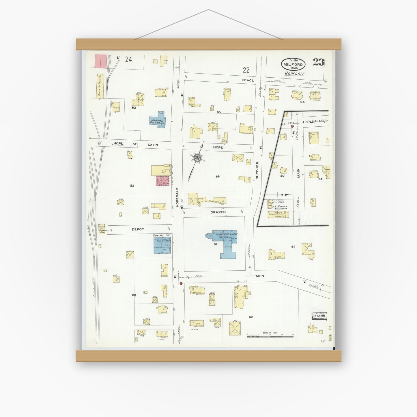 Old map wall art mockup — magnetic wood frame on white wall — Sanborn Fire Insurance Map from Milford, Worcester County, Massachusetts (1910), Sheet #0023