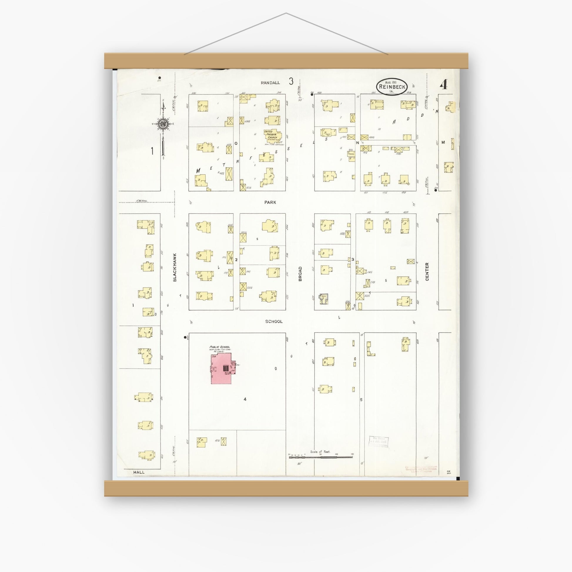 Old map wall art mockup — magnetic wood frame on white wall — Sanborn Fire Insurance Map from Reinbeck, Grundy County, Iowa (1911), Sheet #0004