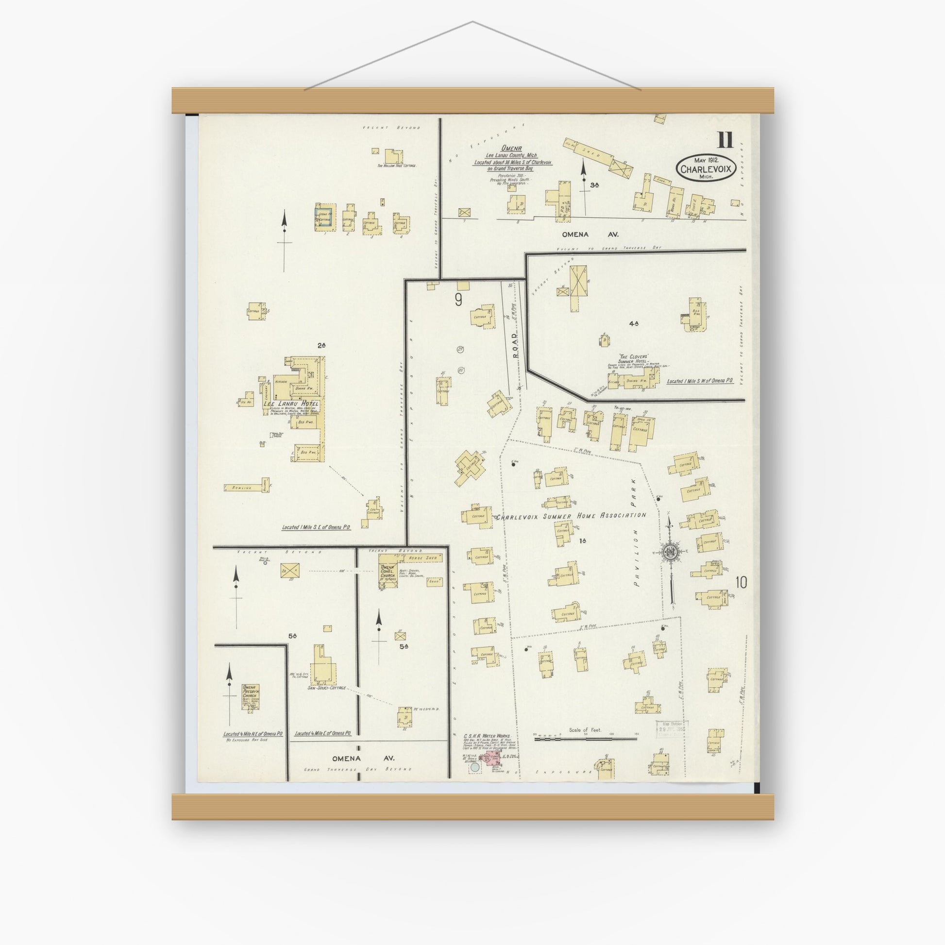 Old map wall art mockup — magnetic wood frame on white wall — Sanborn Fire Insurance Map from Charlevoix, Charlevoix County, Michigan (1912), Sheet #0011