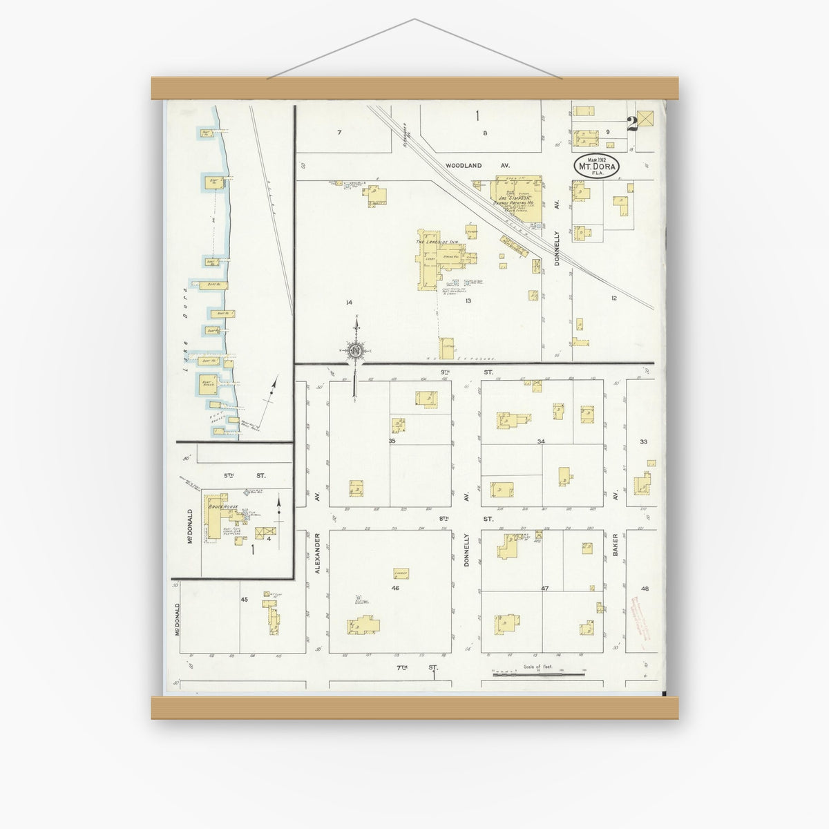 Old map wall art mockup — magnetic wood frame on white wall — Sanborn Fire Insurance Map from Mount Dora, Lake County, Florida (1912), Sheet #0002