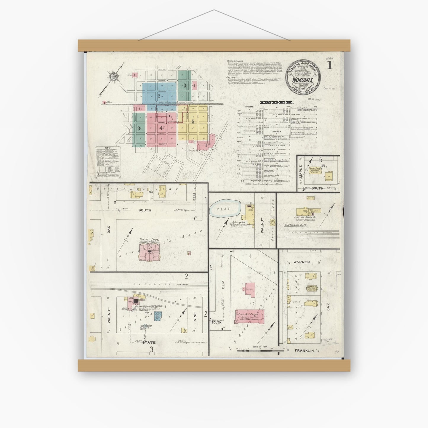 Old map wall art mockup — magnetic wood frame on white wall — Sanborn Fire Insurance Map from Nokomis, Montgomery County, Illinois (1912), Sheet #0001