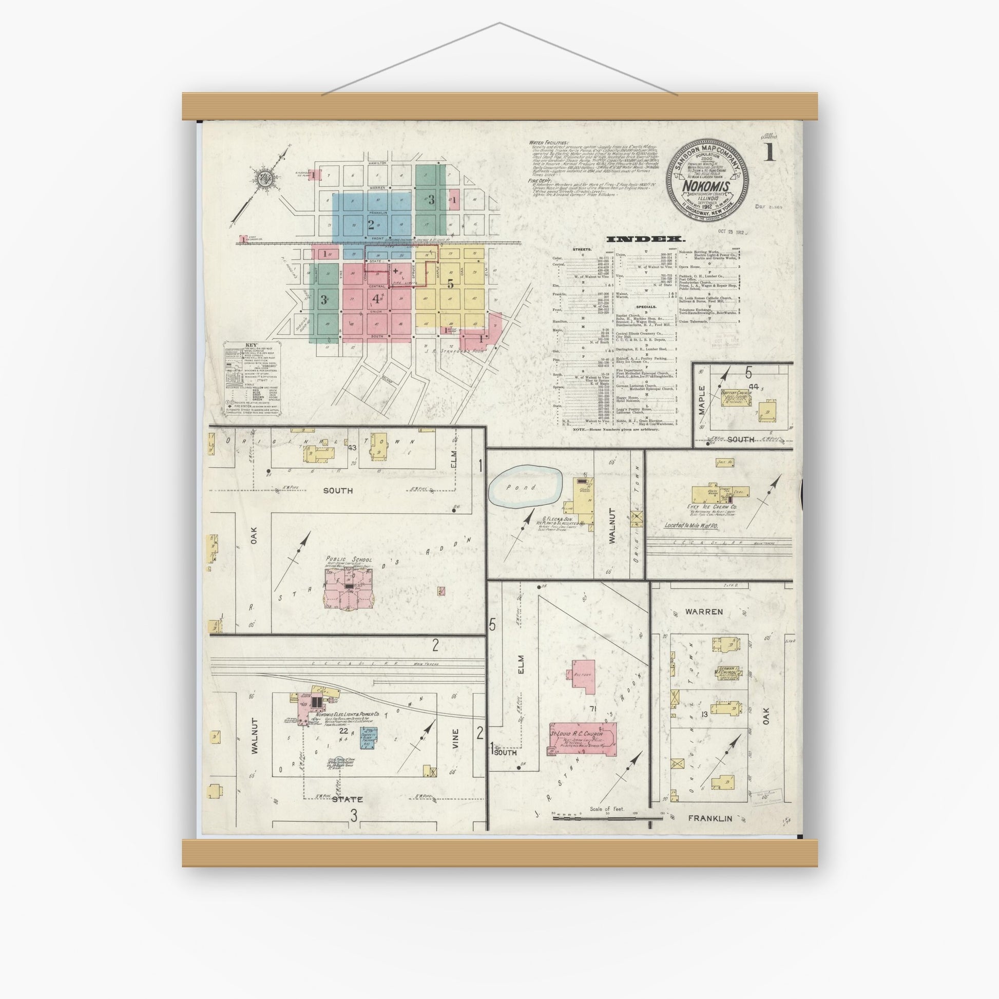 Old map wall art mockup — magnetic wood frame on white wall — Sanborn Fire Insurance Map from Nokomis, Montgomery County, Illinois (1912), Sheet #0001