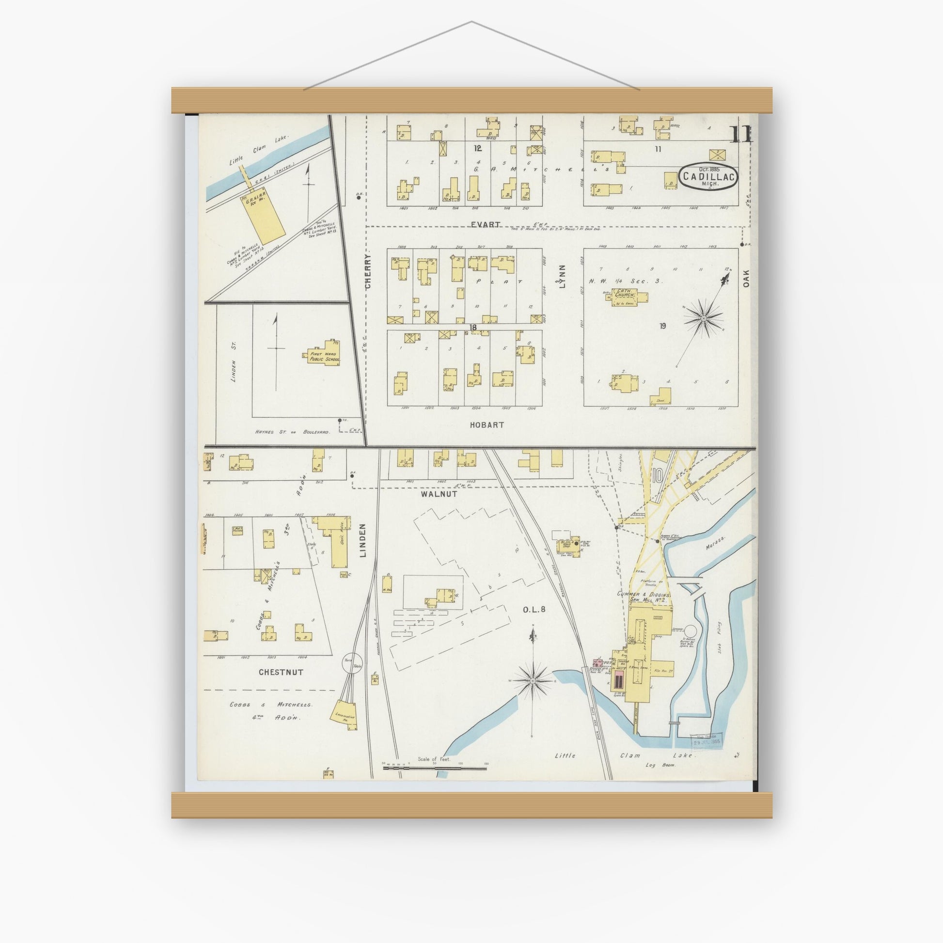 Old map wall art mockup — magnetic wood frame on white wall — Sanborn Fire Insurance Map from Cadillac, Wexford County, Michigan (1895), Sheet #0011