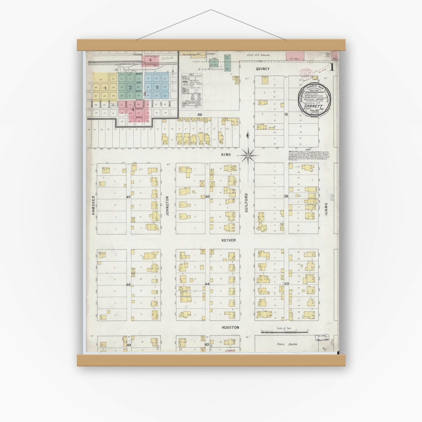 Old map wall art mockup — magnetic wood frame on white wall — Sanborn Fire Insurance Map from Garrett, De Kalb County, Indiana (1895) - Complete Map Set