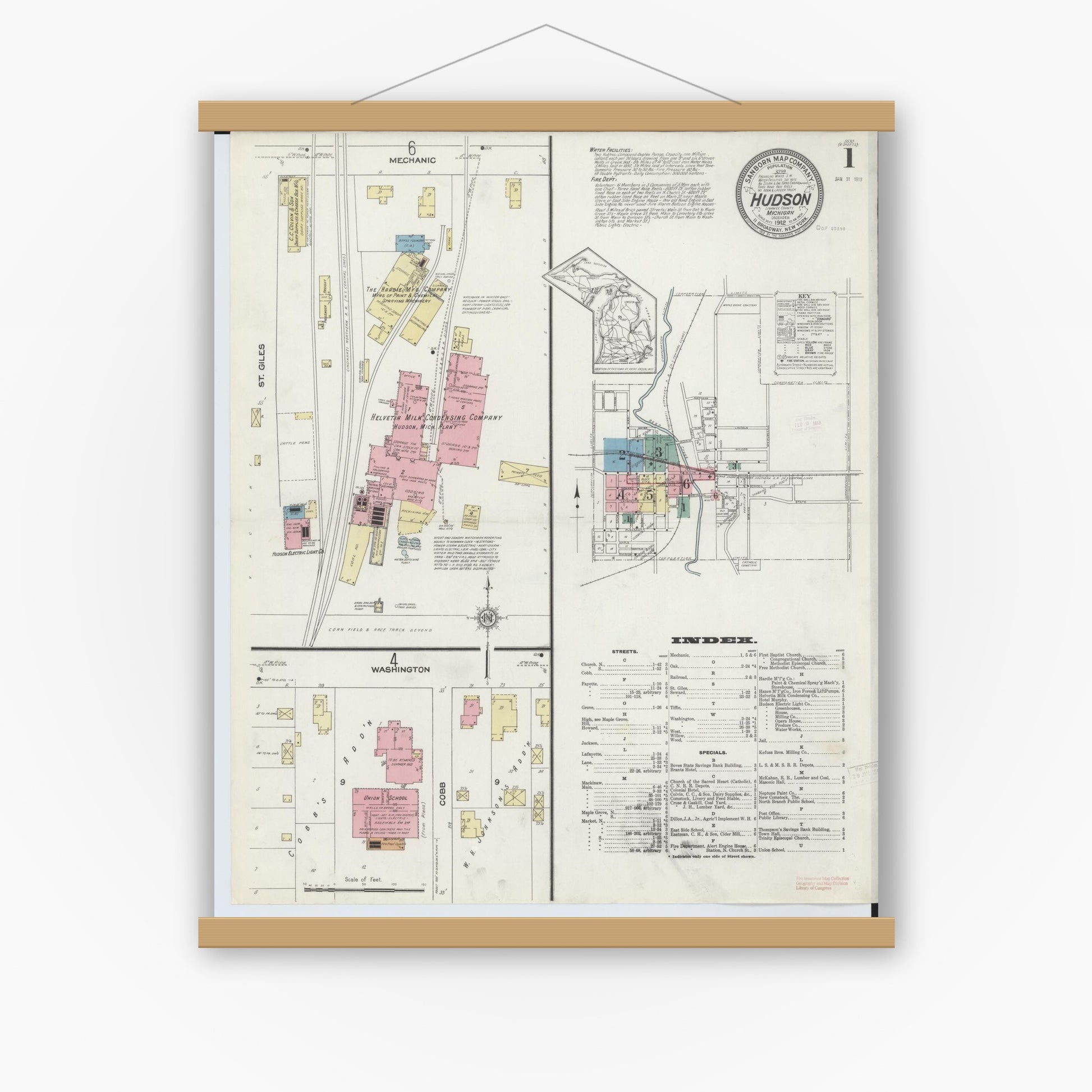 Old map wall art mockup — magnetic wood frame on white wall — Sanborn Fire Insurance Map from Hudson, Lenawee County, Michigan (1912) - Complete Map Set