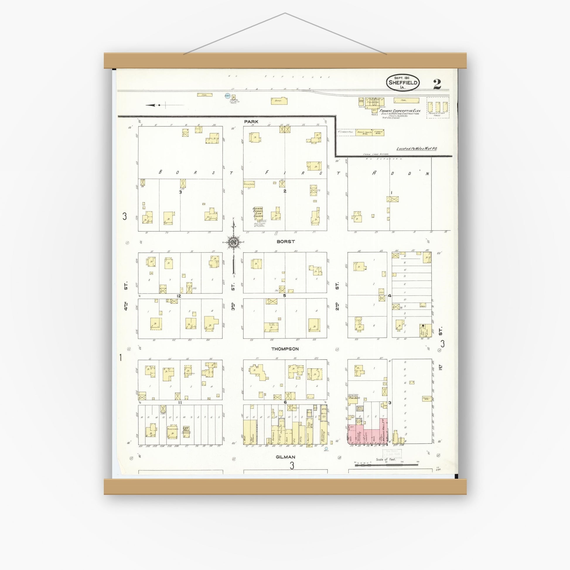 Old map wall art mockup — magnetic wood frame on white wall — Sanborn Fire Insurance Map from Sheffield, Franklin County, Iowa (1911), Sheet #0002