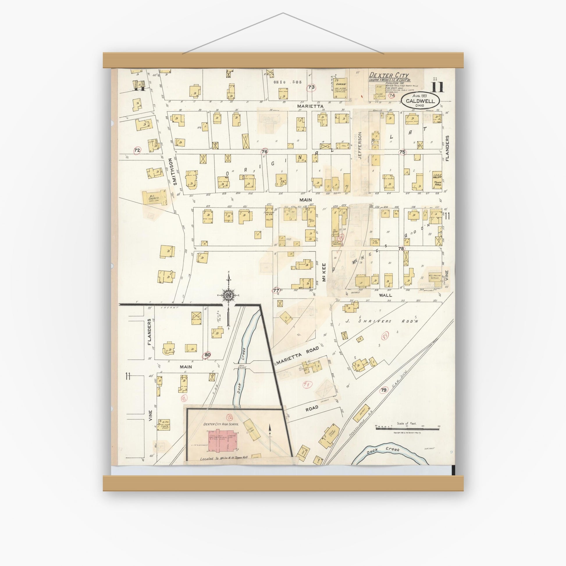 Old map wall art mockup — magnetic wood frame on white wall — Sanborn Fire Insurance Map from Caldwell, Noble County, Ohio (1932), Sheet #0011