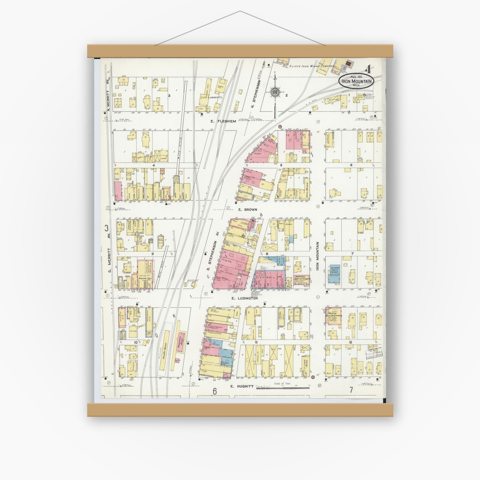 Old map wall art mockup — magnetic wood frame on white wall — Sanborn Fire Insurance Map from Iron Mountain, Dickinson County, Michigan (1911), Sheet #0004