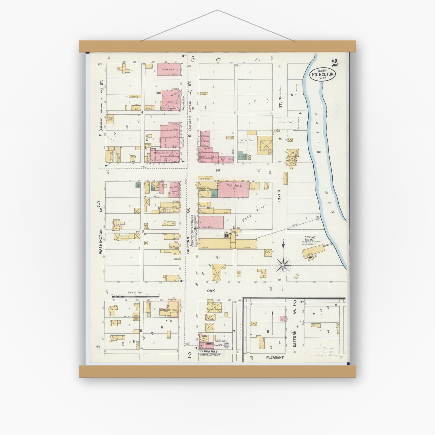 Old map wall art mockup — magnetic wood frame on white wall — Sanborn Fire Insurance Map from Princeton, Mille Lacs County, Minnesota (1899), Sheet #0002