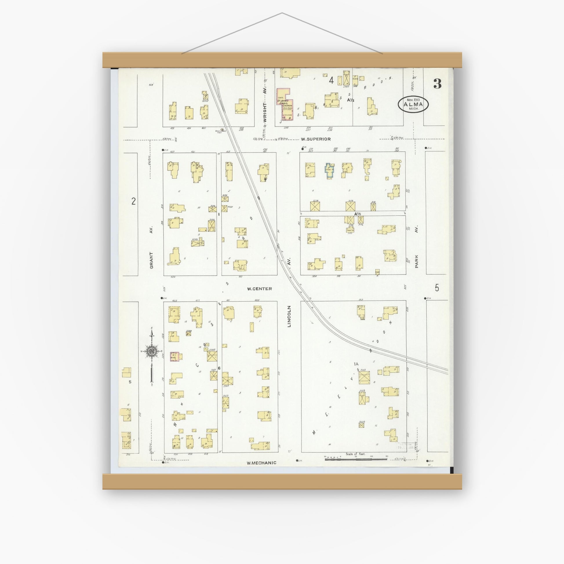 Old map wall art mockup — magnetic wood frame on white wall — Sanborn Fire Insurance Map from Alma, Gratiot County, Michigan (1910), Sheet #0003