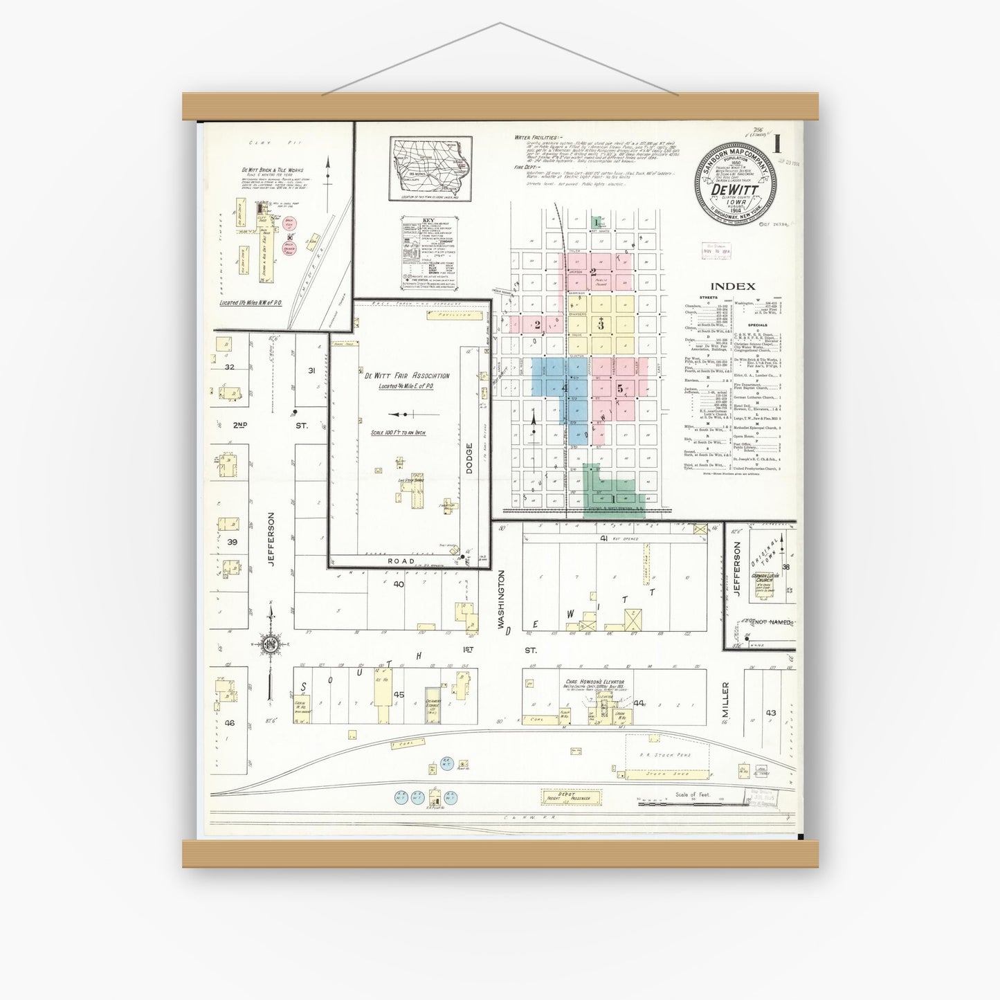 Old map wall art mockup — magnetic wood frame on white wall — Sanborn Fire Insurance Map from De Witt, Clinton County, Iowa (1914) â€” Complete Set