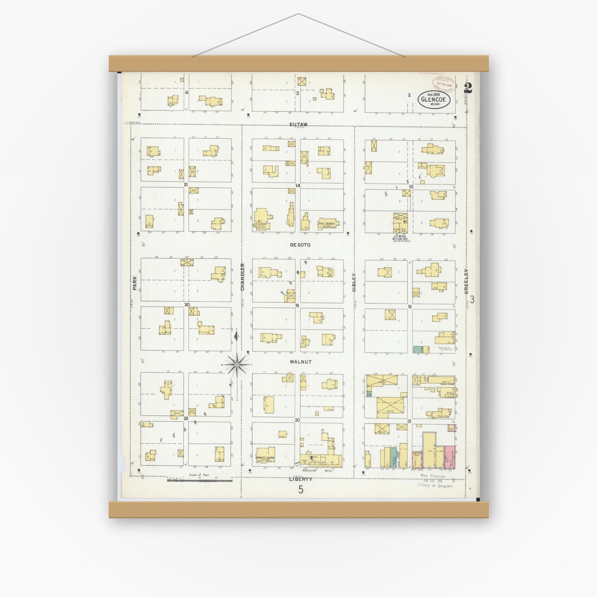 Old map wall art mockup — magnetic wood frame on white wall — Sanborn Fire Insurance Map from Glencoe, Mcleod County, Minnesota (1899), Sheet #0002