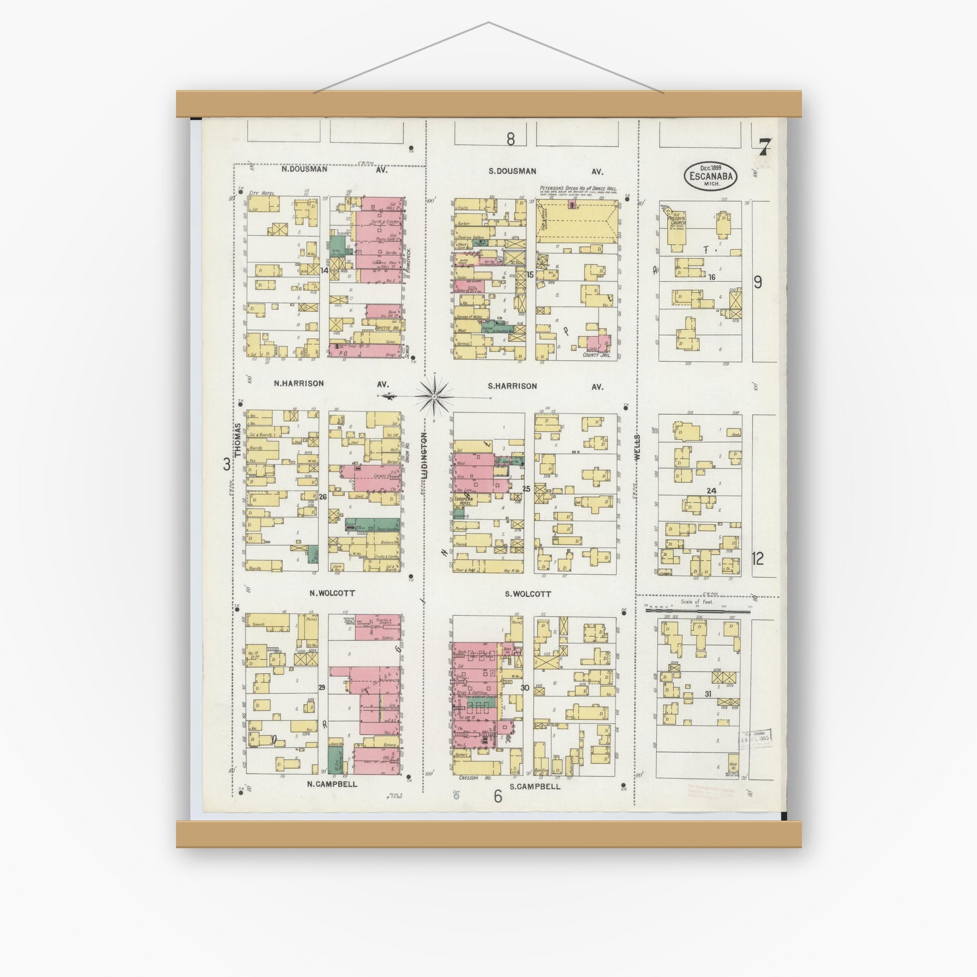 Old map wall art mockup — magnetic wood frame on white wall — Sanborn Fire Insurance Map from Escanaba, Delta County, Michigan (1899), Sheet #0007