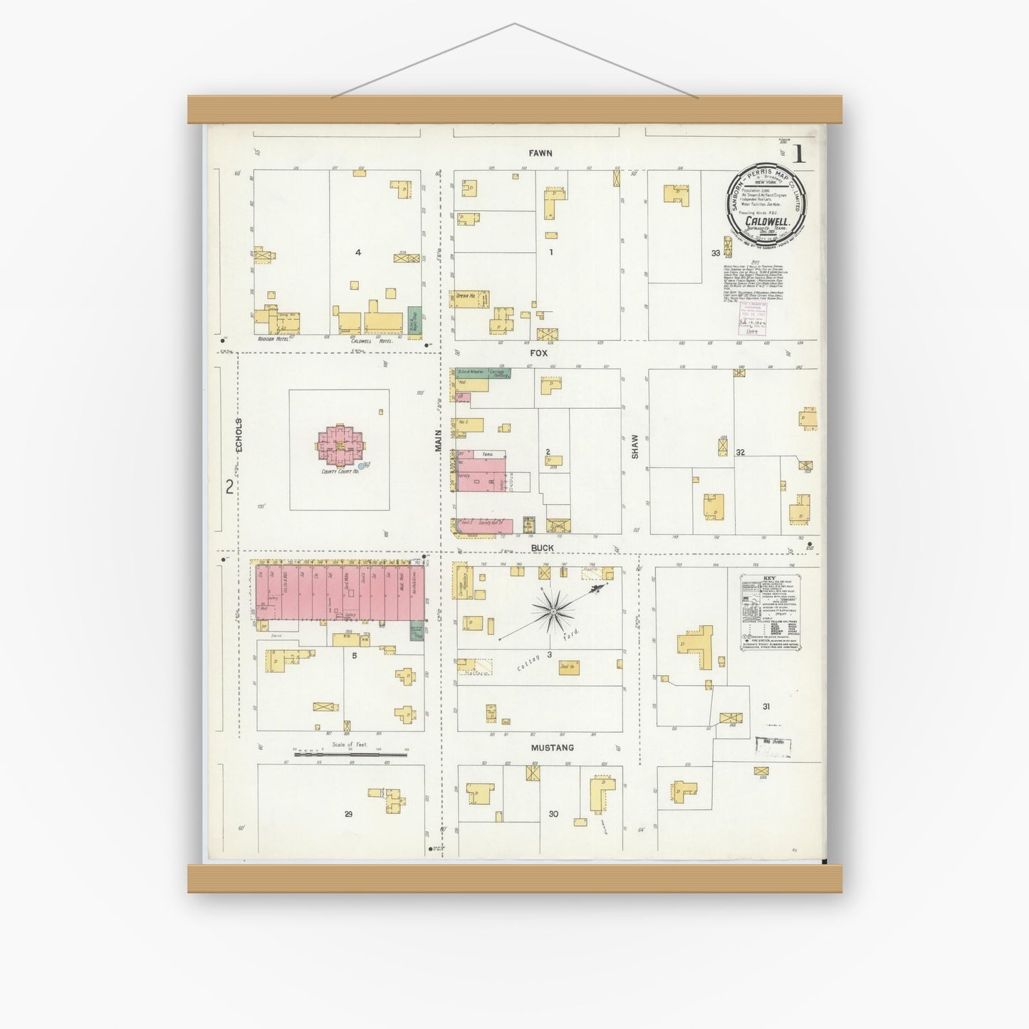 Old map wall art mockup — magnetic wood frame on white wall — Sanborn Fire Insurance Map from Caldwell, Burleson County, Texas (1901), Sheet #0001