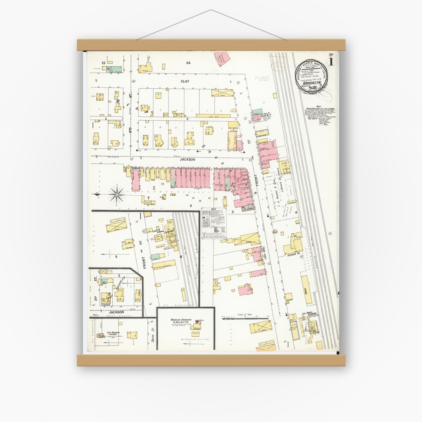 Old map wall art mockup — magnetic wood frame on white wall — Sanborn Fire Insurance Map from Brooklyn, Poweshiek County, Iowa (1899) â€” Complete Set