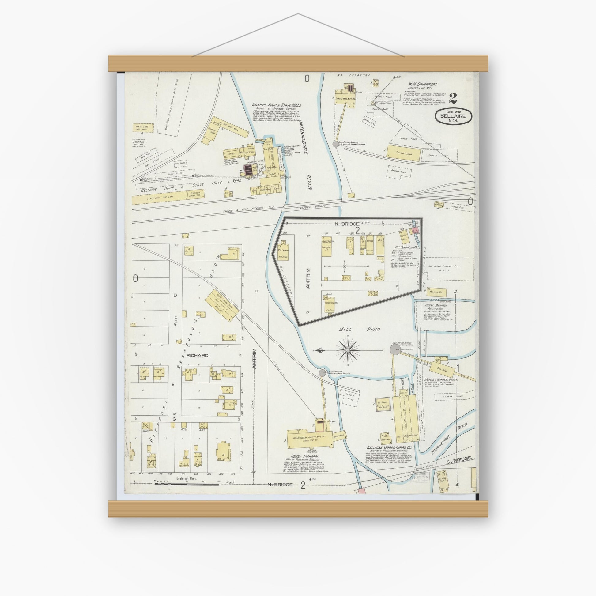 Old map wall art mockup — magnetic wood frame on white wall — Sanborn Fire Insurance Map from Bellaire, Antrim County, Michigan (1898), Sheet #0002
