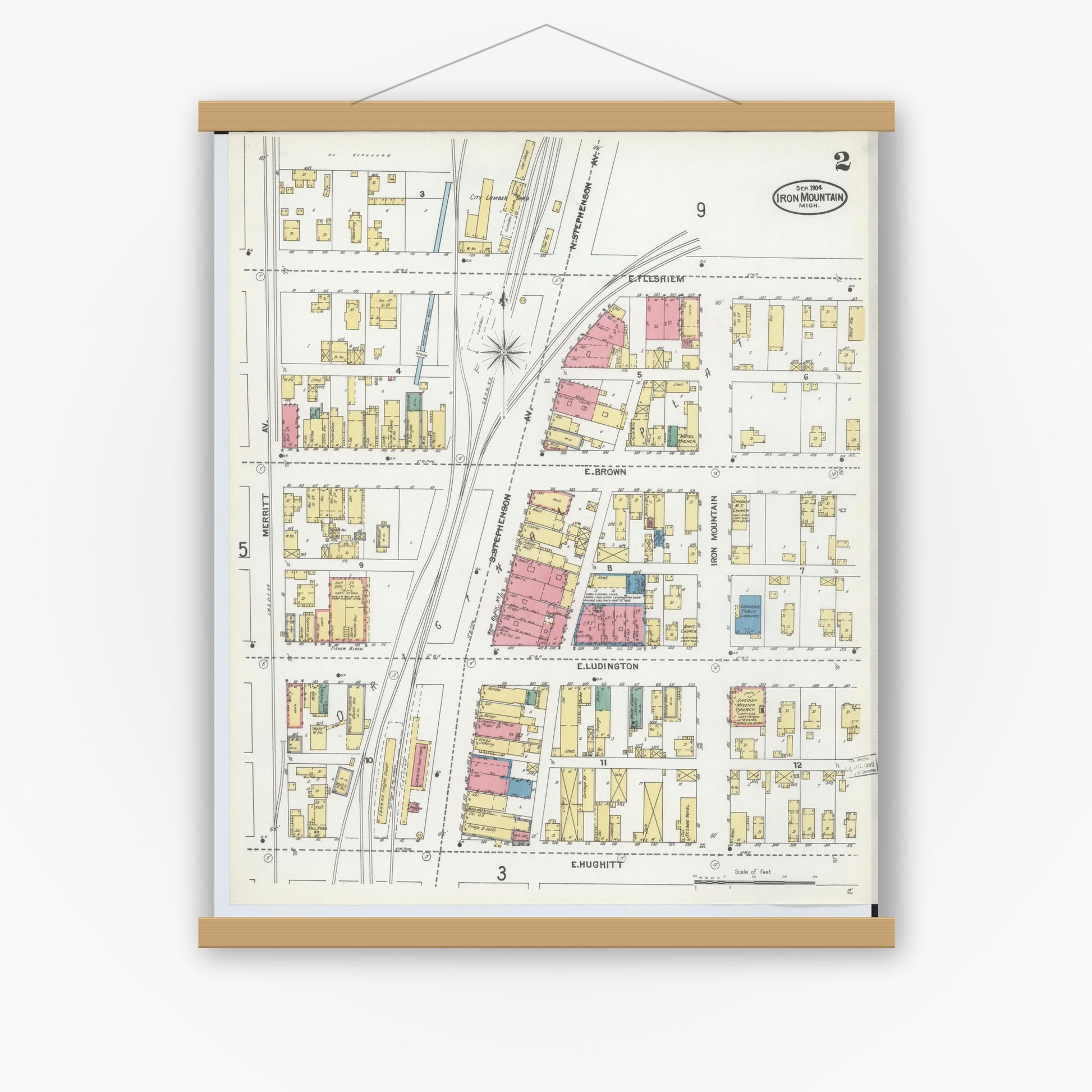 Old map wall art mockup — magnetic wood frame on white wall — Sanborn Fire Insurance Map from Iron Mountain, Dickinson County, Michigan (1904), Sheet #0002