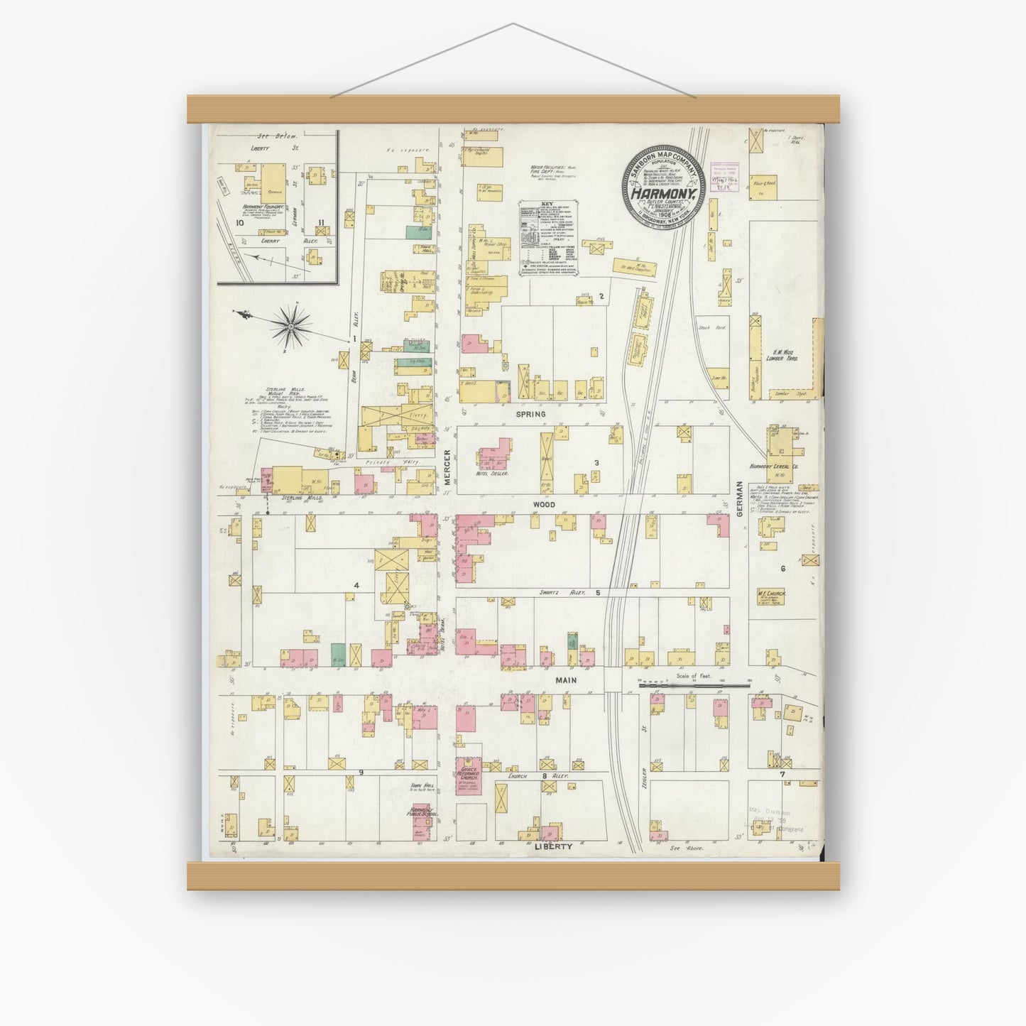 Old map wall art mockup — magnetic wood frame on white wall — Sanborn Fire Insurance Map from Harmony, Butler County, Pennsylvania (1906), Sheet #0001