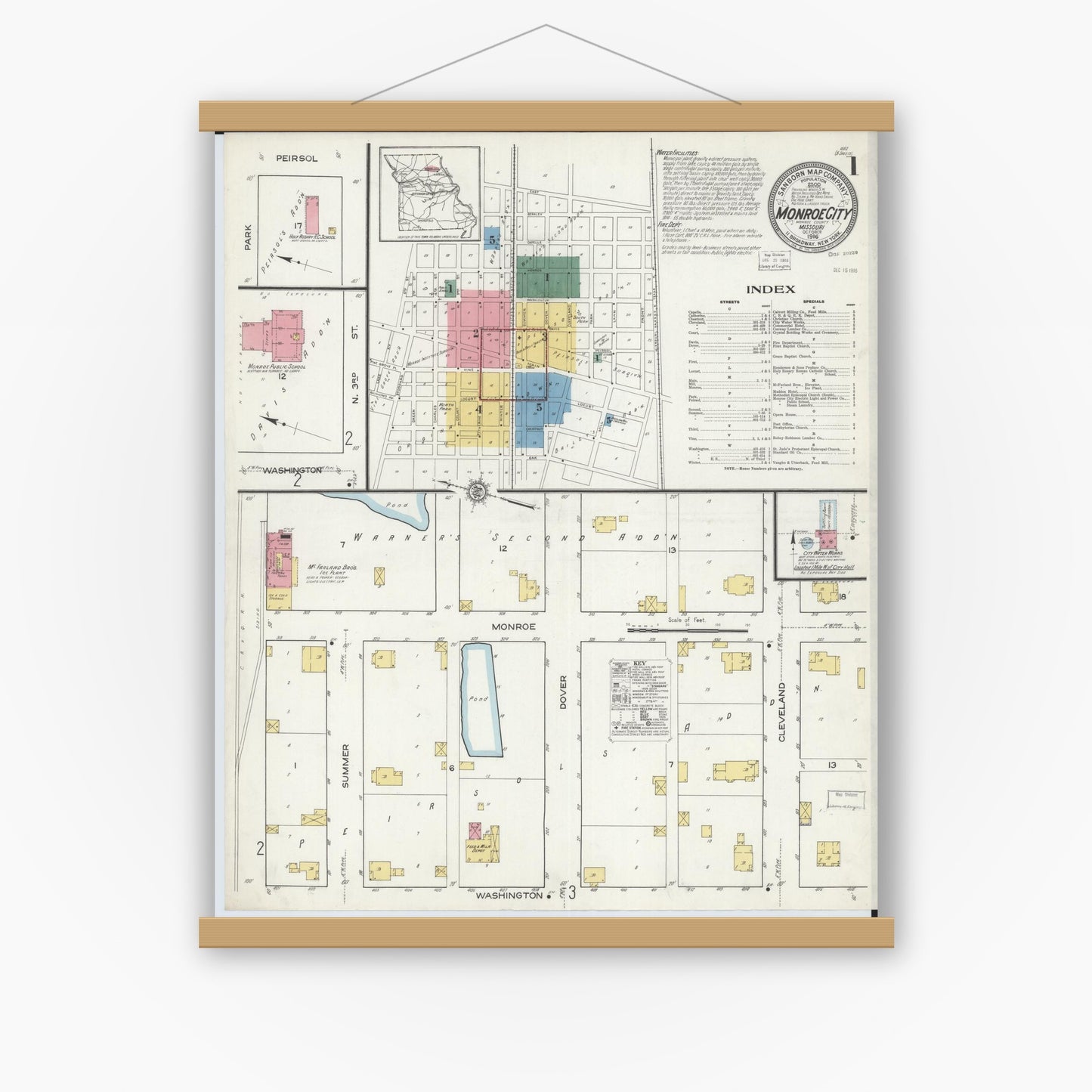 Old map wall art mockup — magnetic wood frame on white wall — Sanborn Fire Insurance Map from Monroe City, Monroe County, Missouri (1916) - Complete Map Set