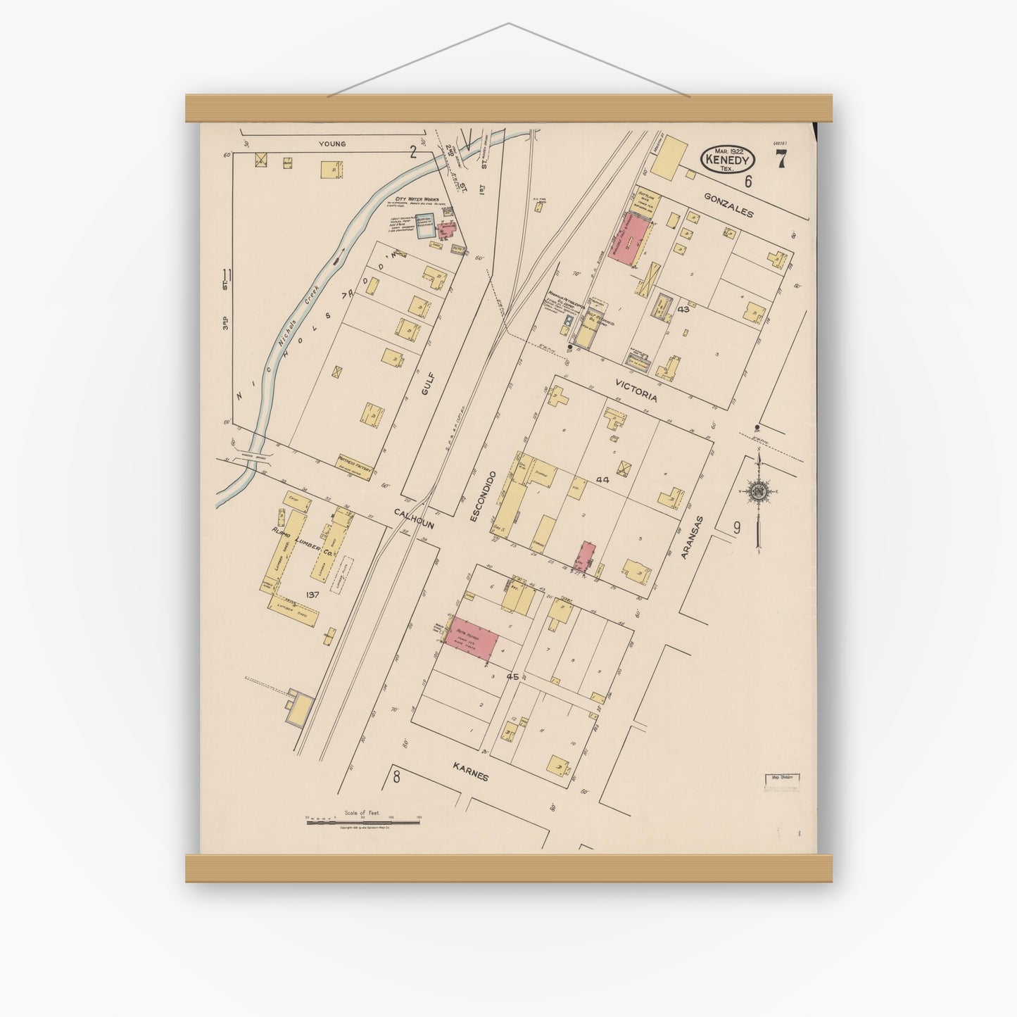 Old map wall art mockup — magnetic wood frame on white wall — Sanborn Fire Insurance Map from Kenedy, Karnes County, Texas (1922), Sheet #0007