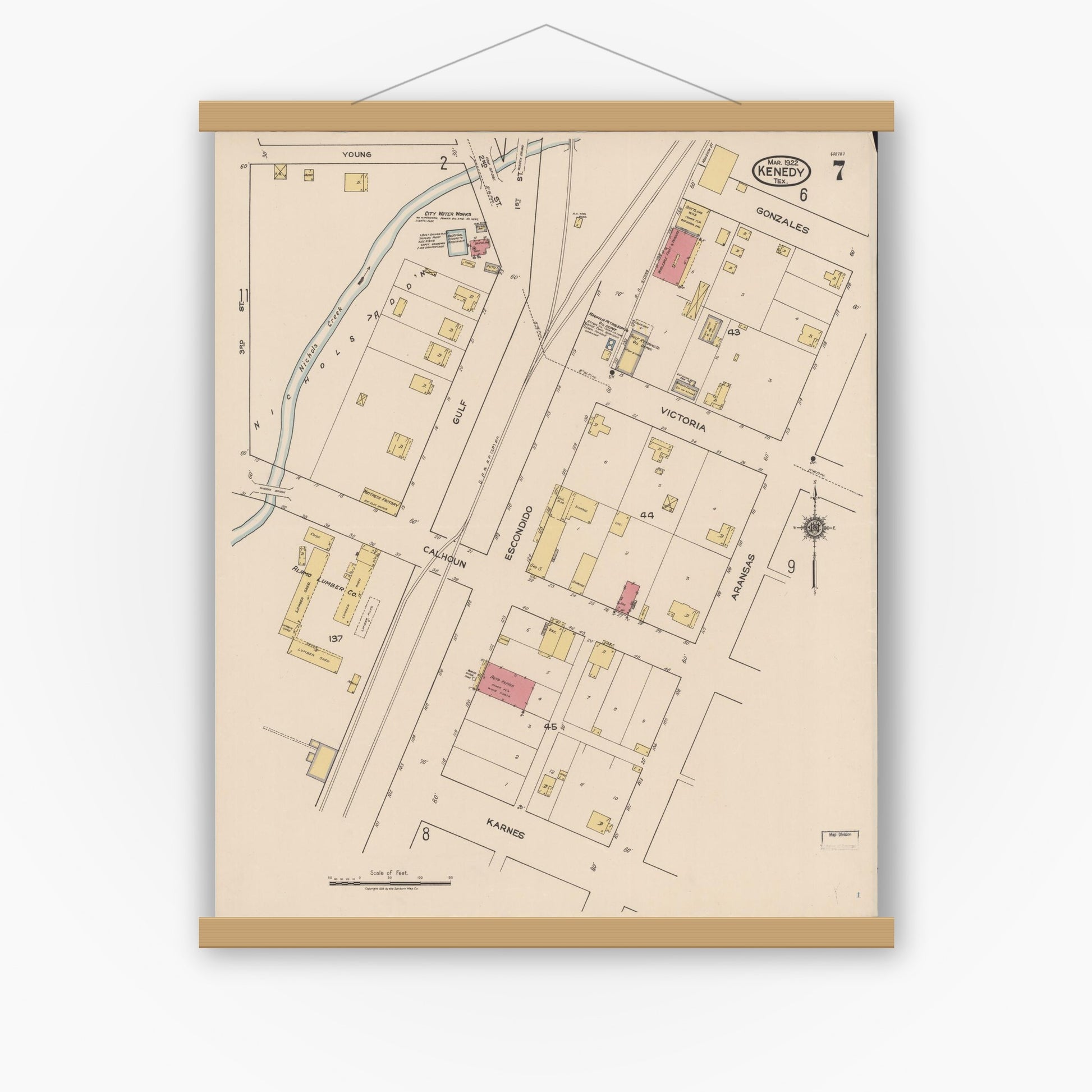 Old map wall art mockup — magnetic wood frame on white wall — Sanborn Fire Insurance Map from Kenedy, Karnes County, Texas (1922), Sheet #0007