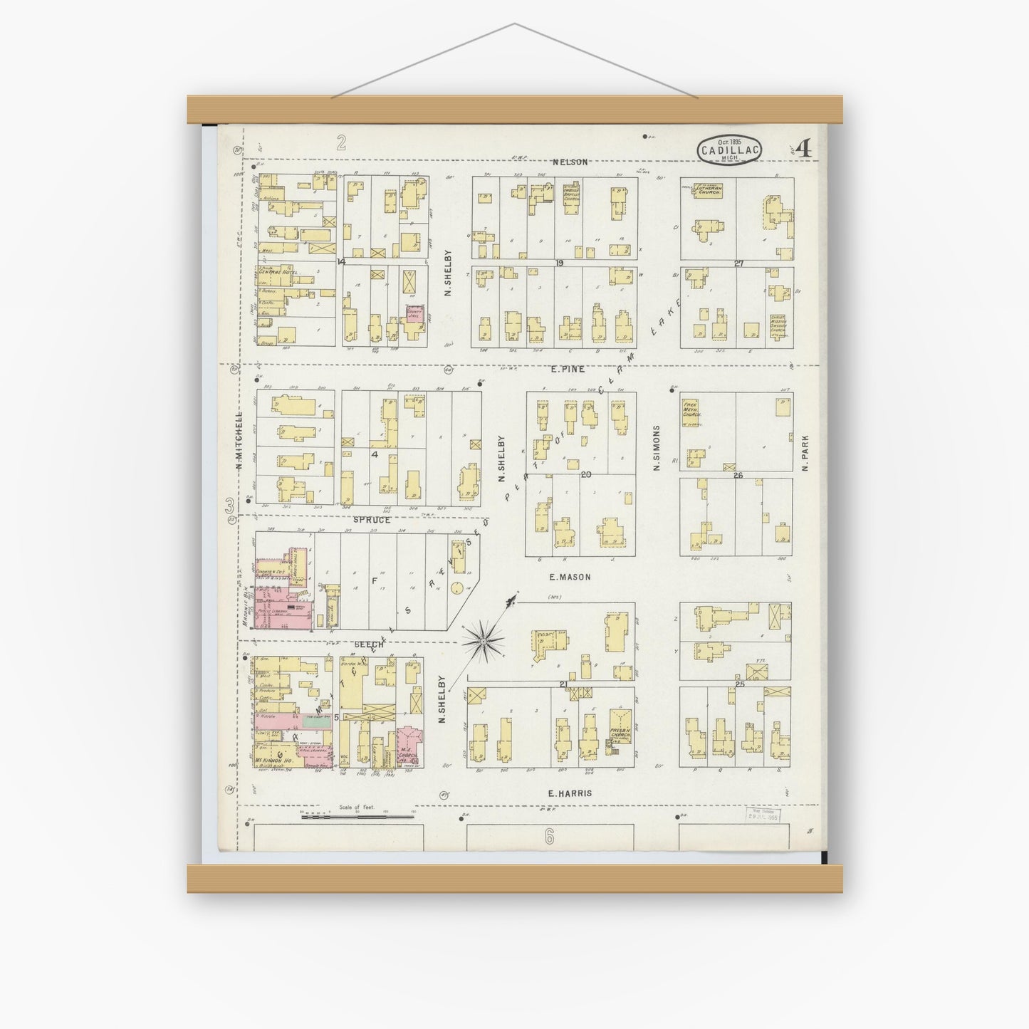 Old map wall art mockup — magnetic wood frame on white wall — Sanborn Fire Insurance Map from Cadillac, Wexford County, Michigan (1895), Sheet #0004