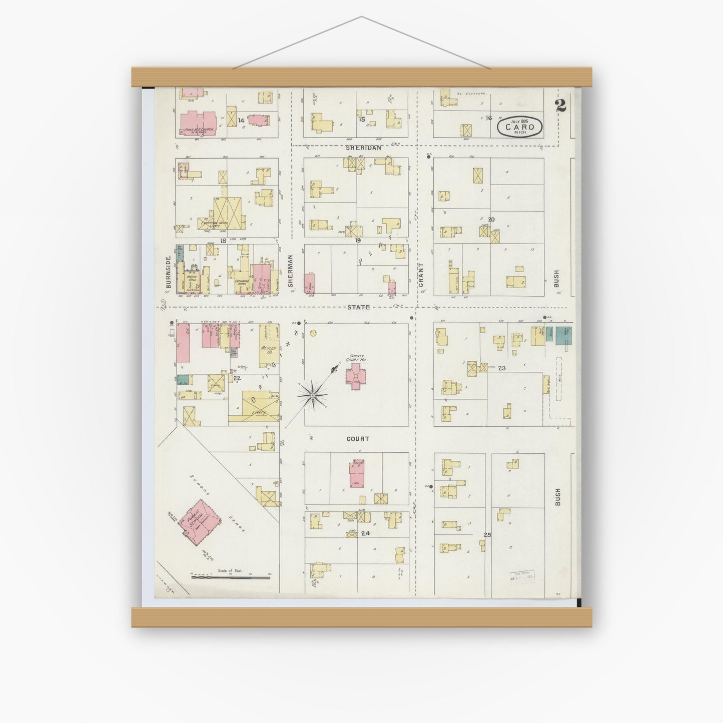 Old map wall art mockup — magnetic wood frame on white wall — Sanborn Fire Insurance Map from Caro, Tuscola County, Michigan (1895), Sheet #0002