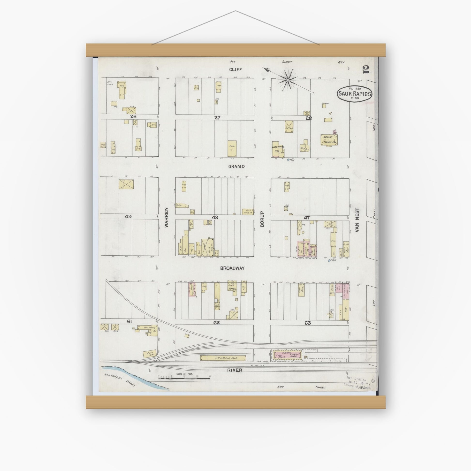 Old map wall art mockup — magnetic wood frame on white wall — Sanborn Fire Insurance Map from Sauk Rapids, Benton County, Minnesota (1889), Sheet #0002
